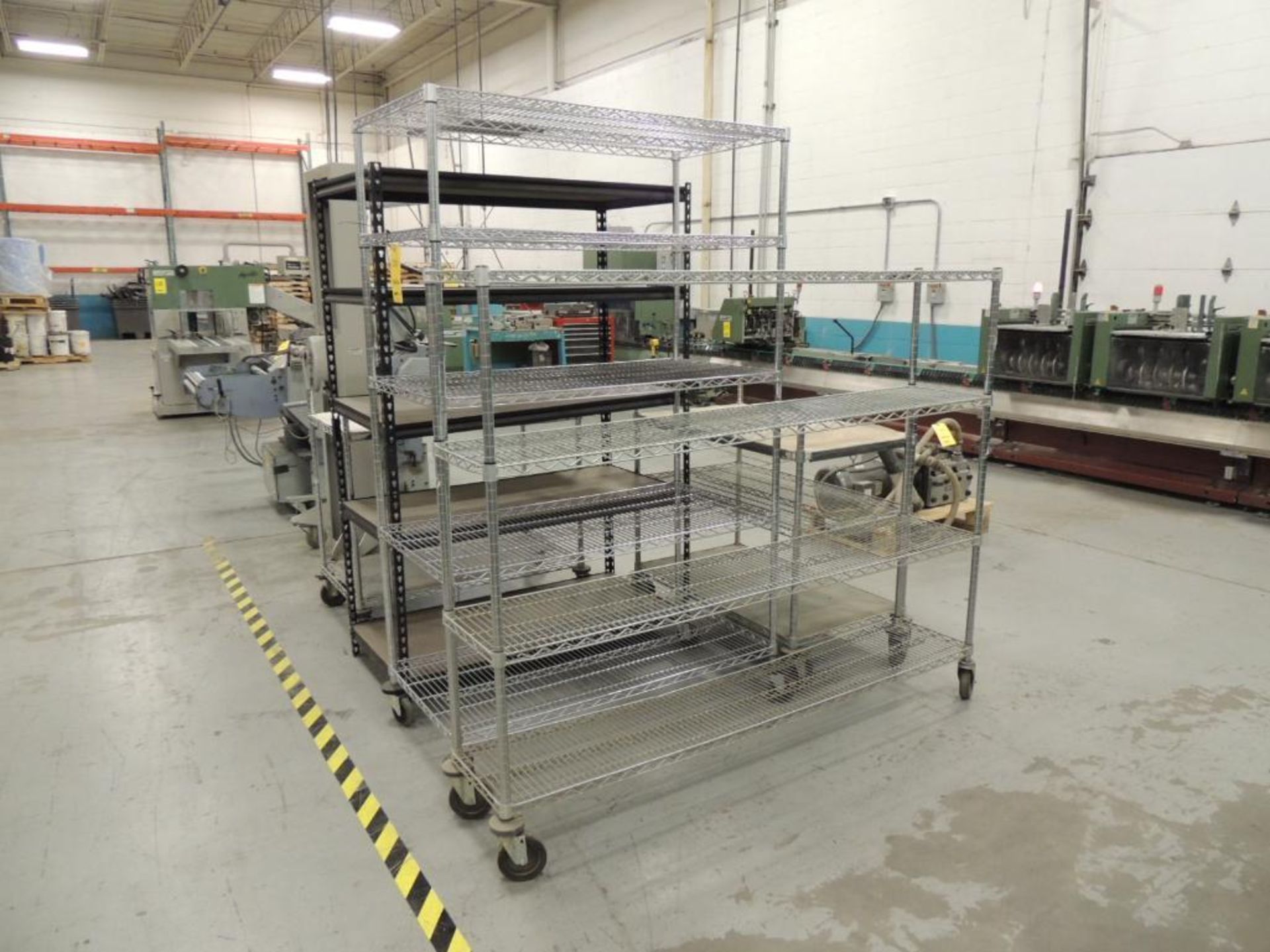 LOT: (5) Stainless Steel Display Racks on Casters