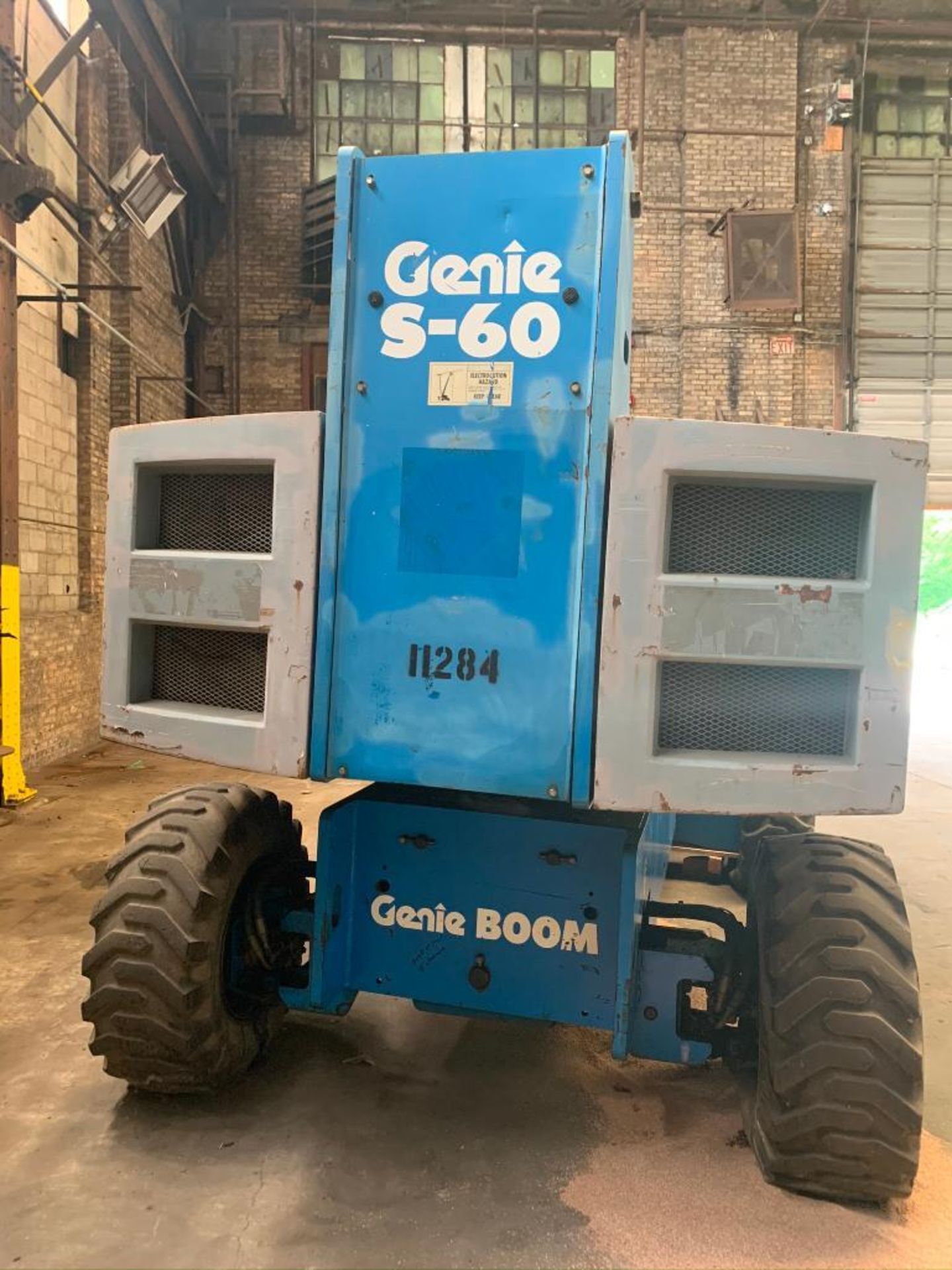 Genie Boom 360 Degree 4-Wheel Drive Telescoping Lift, with Remote Controlled Man Cage - Image 2 of 4