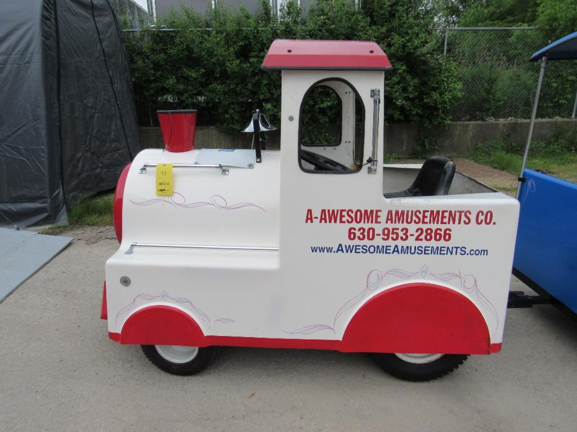 Royal Rides Trackless Train and custom 24' long V-Nose trailer with 3 access doors and fold down ram - Image 4 of 17