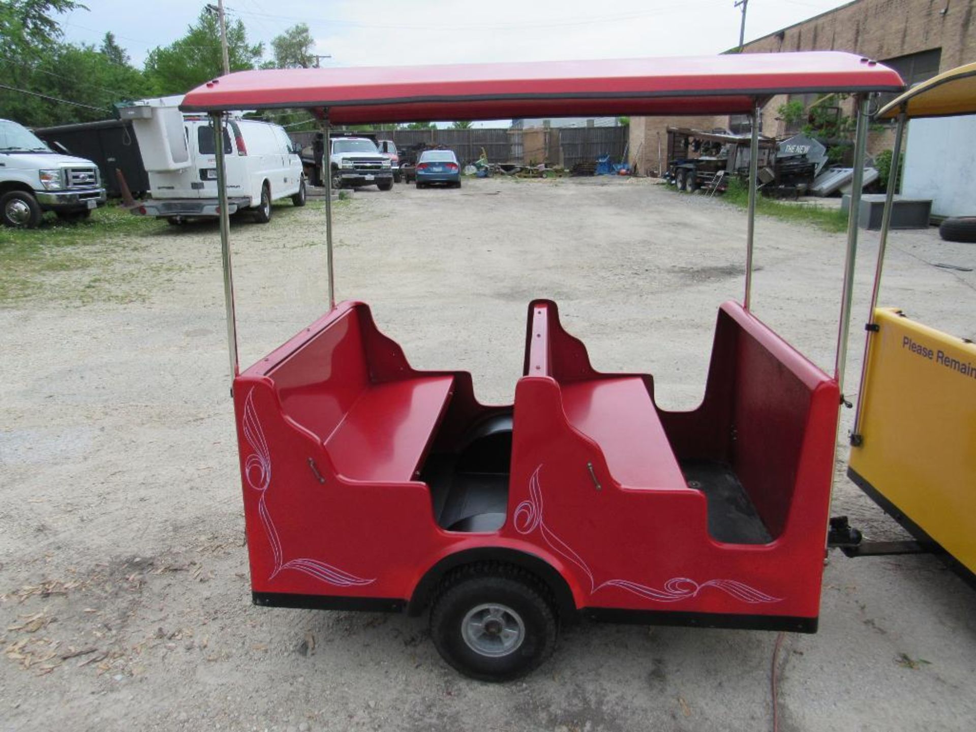 Royal Rides Trackless Train and custom 24' long V-Nose trailer with 3 access doors and fold down ram - Image 10 of 17