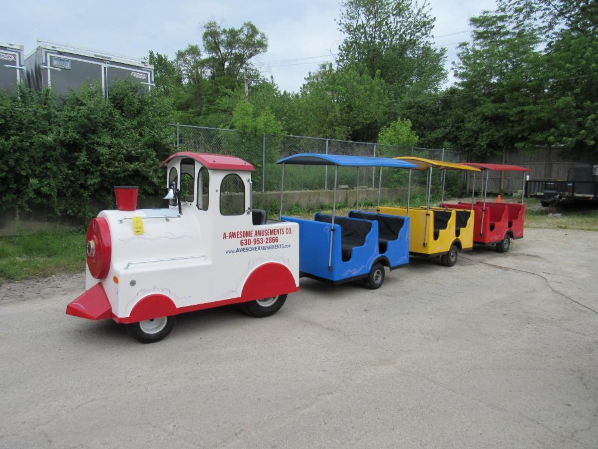 Royal Rides Trackless Train and custom 24' long V-Nose trailer with 3 access doors and fold down ram - Image 2 of 17