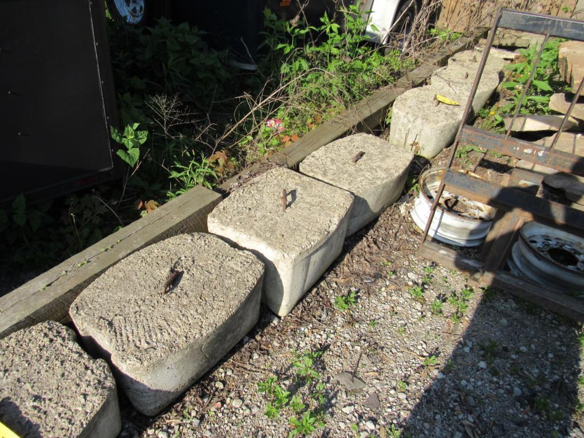 LOT: (4) Cement Tent Weights