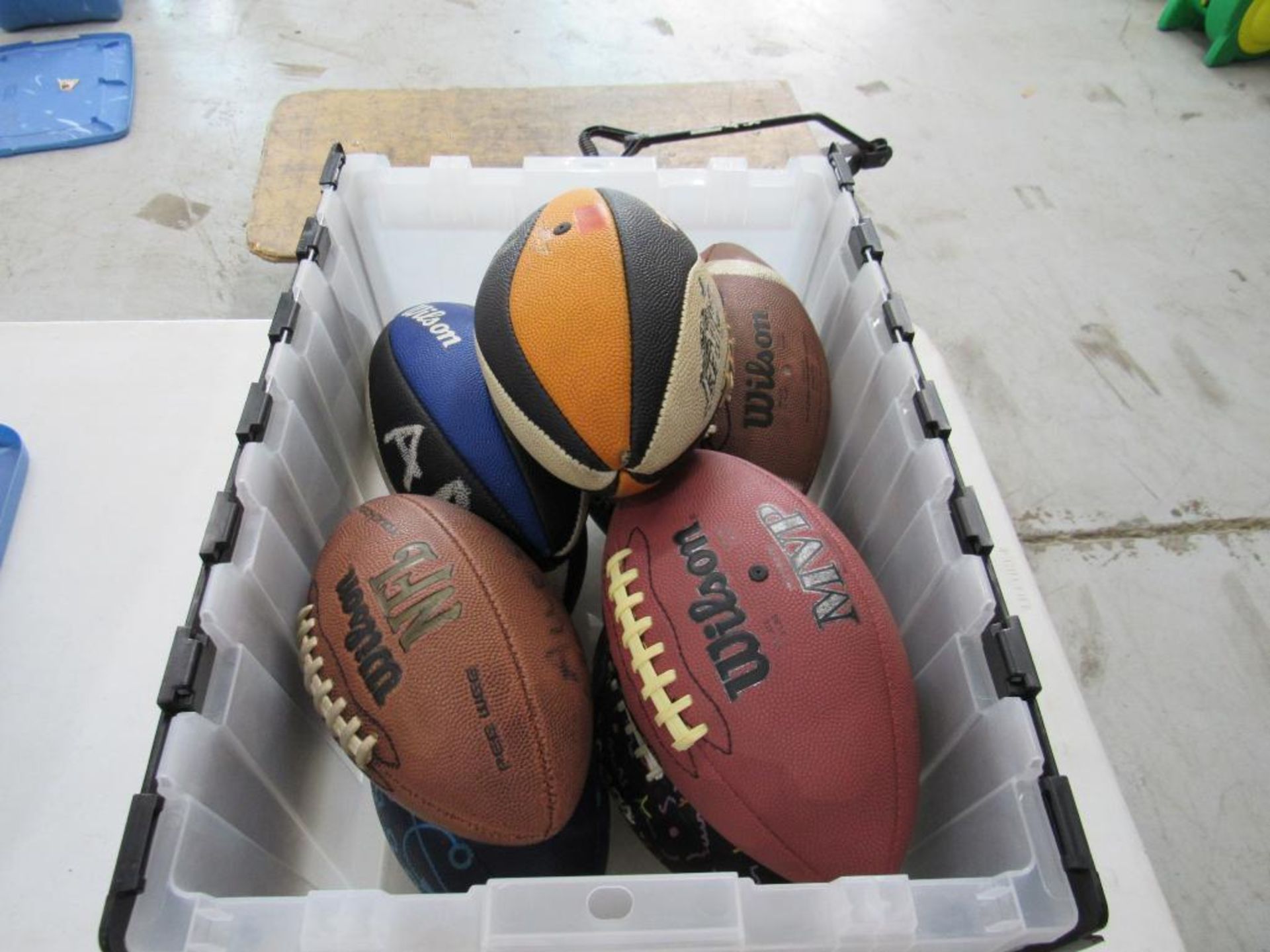 LOT: (9) Footballs