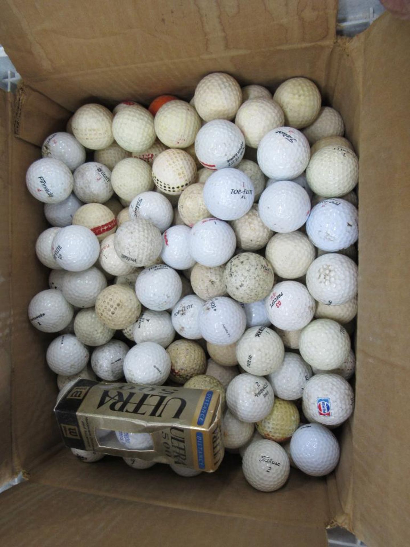 Crate of Golf Balls