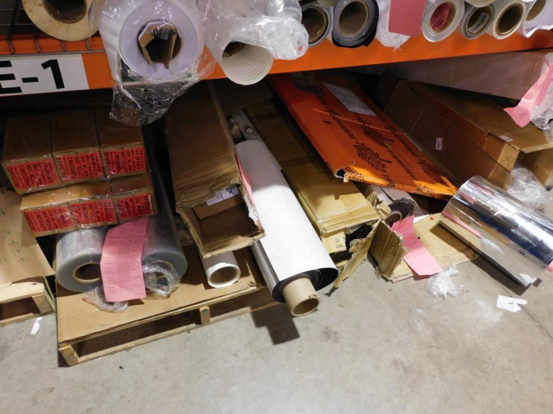 LOT: Assorted Cardboard & Rolls of Material (on pallet rack - contents only)