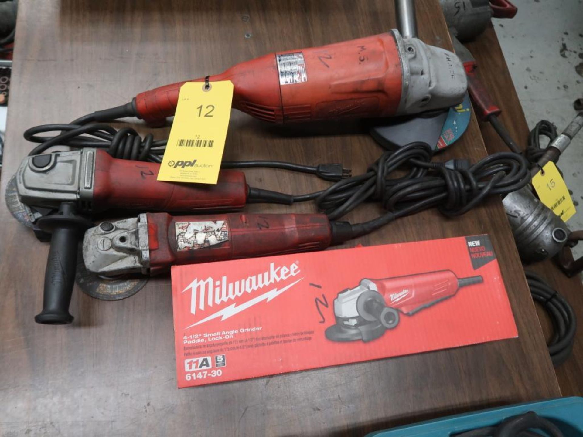 LOT: (3) Milwaukee 4-1/2 in. Right Angle Grinders (one new), (1) Milwaukee 7 in. Right Angle Grinder