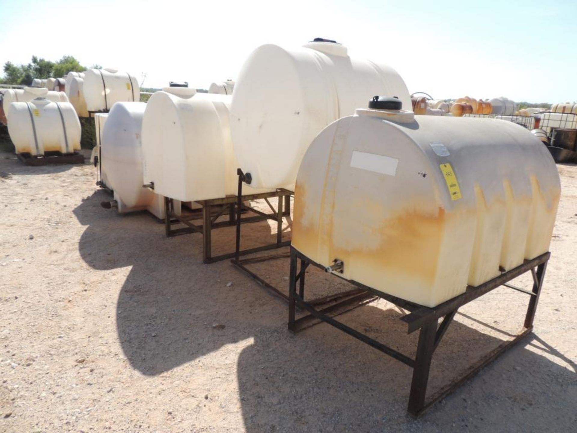 LOT: (7) Poly Tanks - (1) 535 Gallon, (3) 330 Gallon, (3) 80 Gallon (LOCATED IN HENNESSEY, OK. -