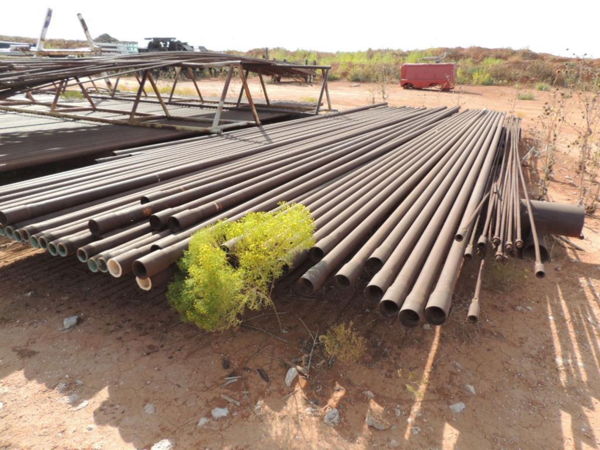 LOT: 2 3/8 In. J55 Tubing 7,800 Ft. Estimated, Pipe Racks included (Located Lower Yard)(LOCATED IN H - Image 4 of 8