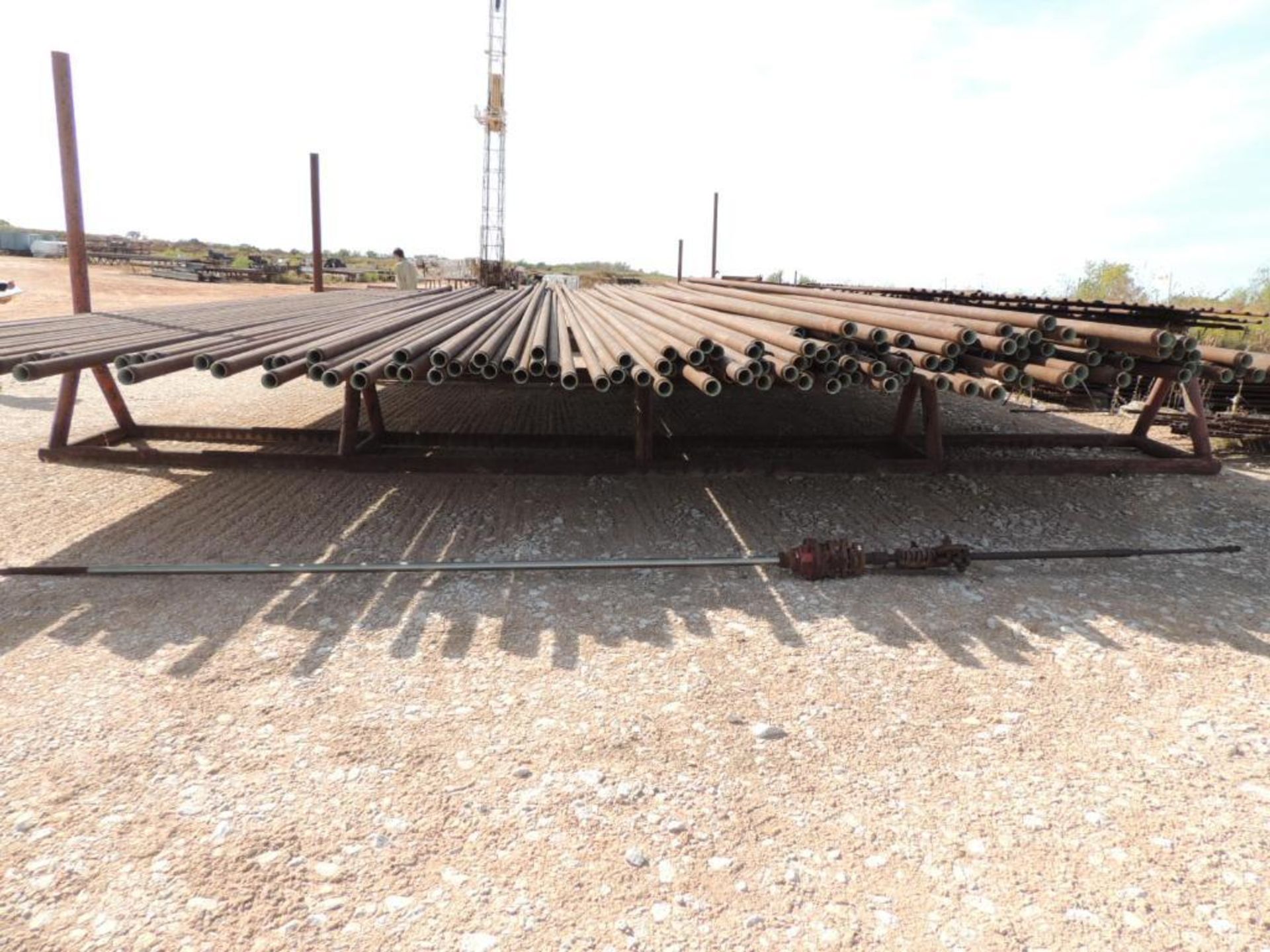 LOT: 2 7/8 In. Coated J55 Tubing, 3,600 ft. Estimated, Pipe Racks included (Located Lower Yard)(LOCA - Image 3 of 4