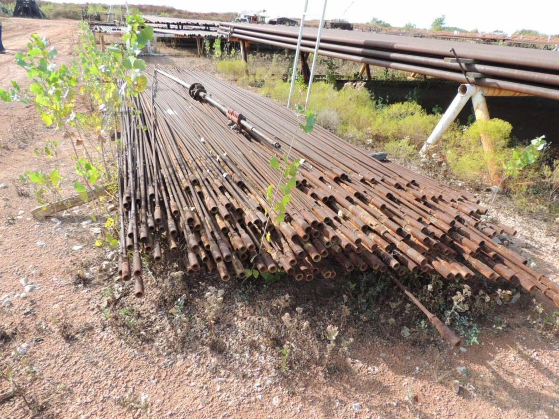 LOT: 3/4 In. and 7/8 in. Sucker Rod, 8,000 Ft. Estimated, Pipe Racks Included (Located Lower Yard)(L - Image 2 of 4