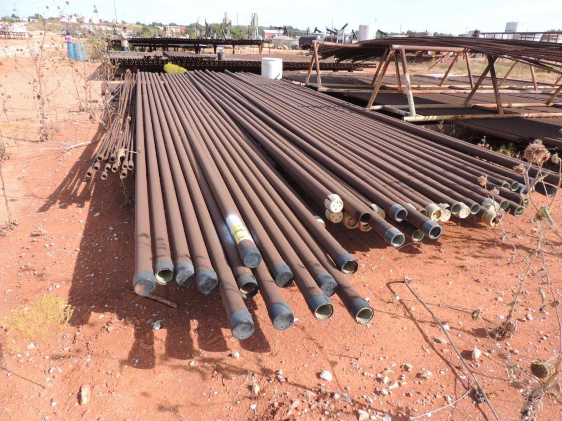 LOT: 2 3/8 In. J55 Tubing 7,800 Ft. Estimated, Pipe Racks included (Located Lower Yard)(LOCATED IN H - Image 2 of 8
