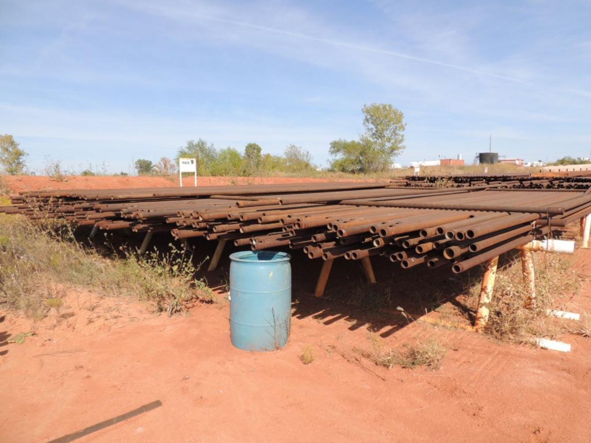 LOT: 2 3/8 In. J55 Tubing 12,000 Ft. Estimated, Pipe Racks included (Located Lower Yard)(LOCATED IN - Image 3 of 4