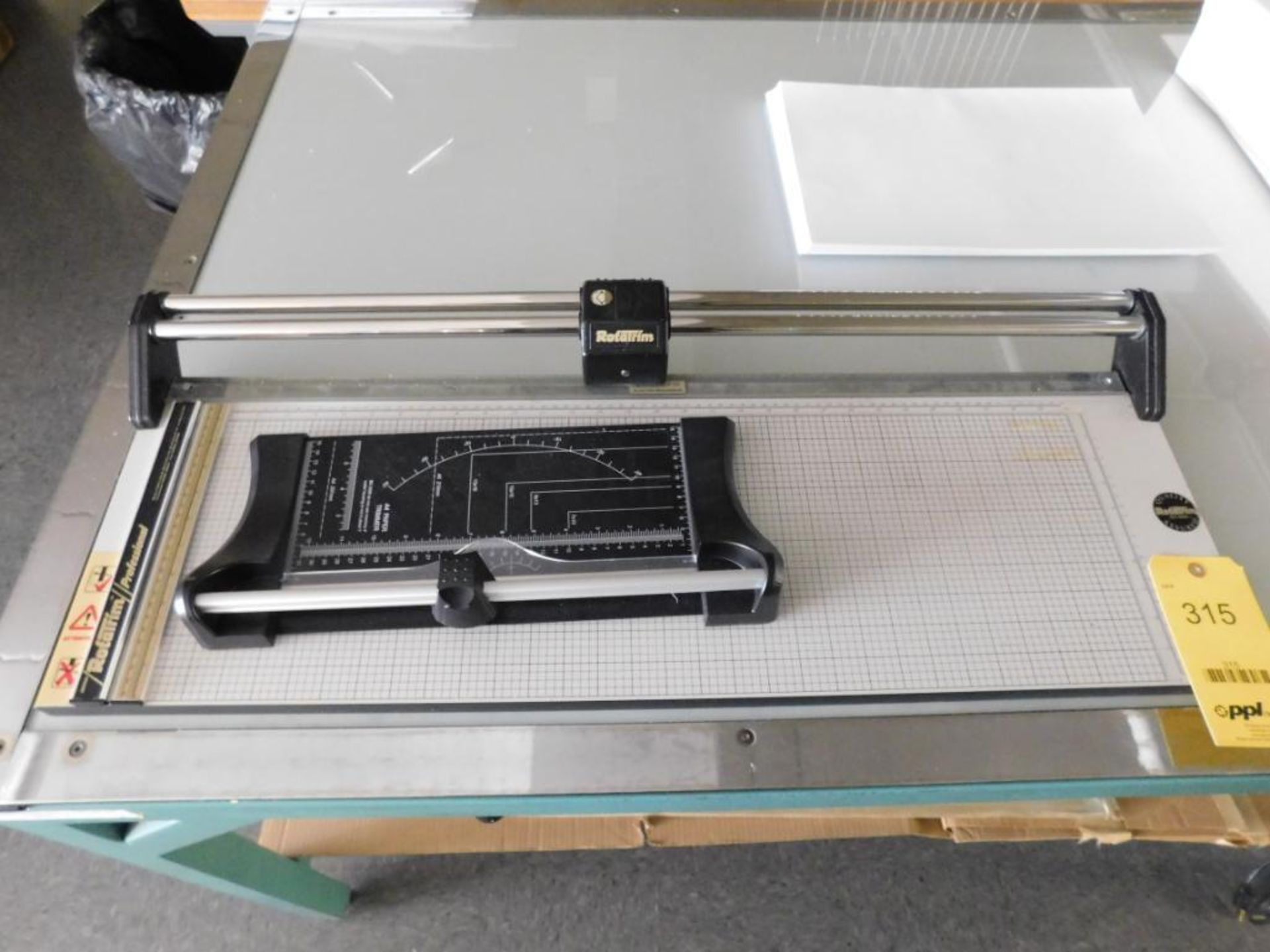 LOT: (1) Rotatrim ISO9002 Cutter, (1) A4 Paper Trimmer (LOCATED IN MINNEAPOLIS, MN.)