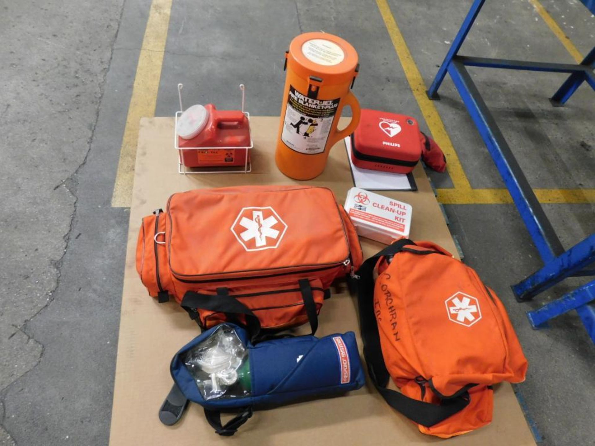 LOT: Safety Equipment, Defibrillators, Oxygen Tank, Fire Blanket, Spill Clean-up Kit, etc. on (1)