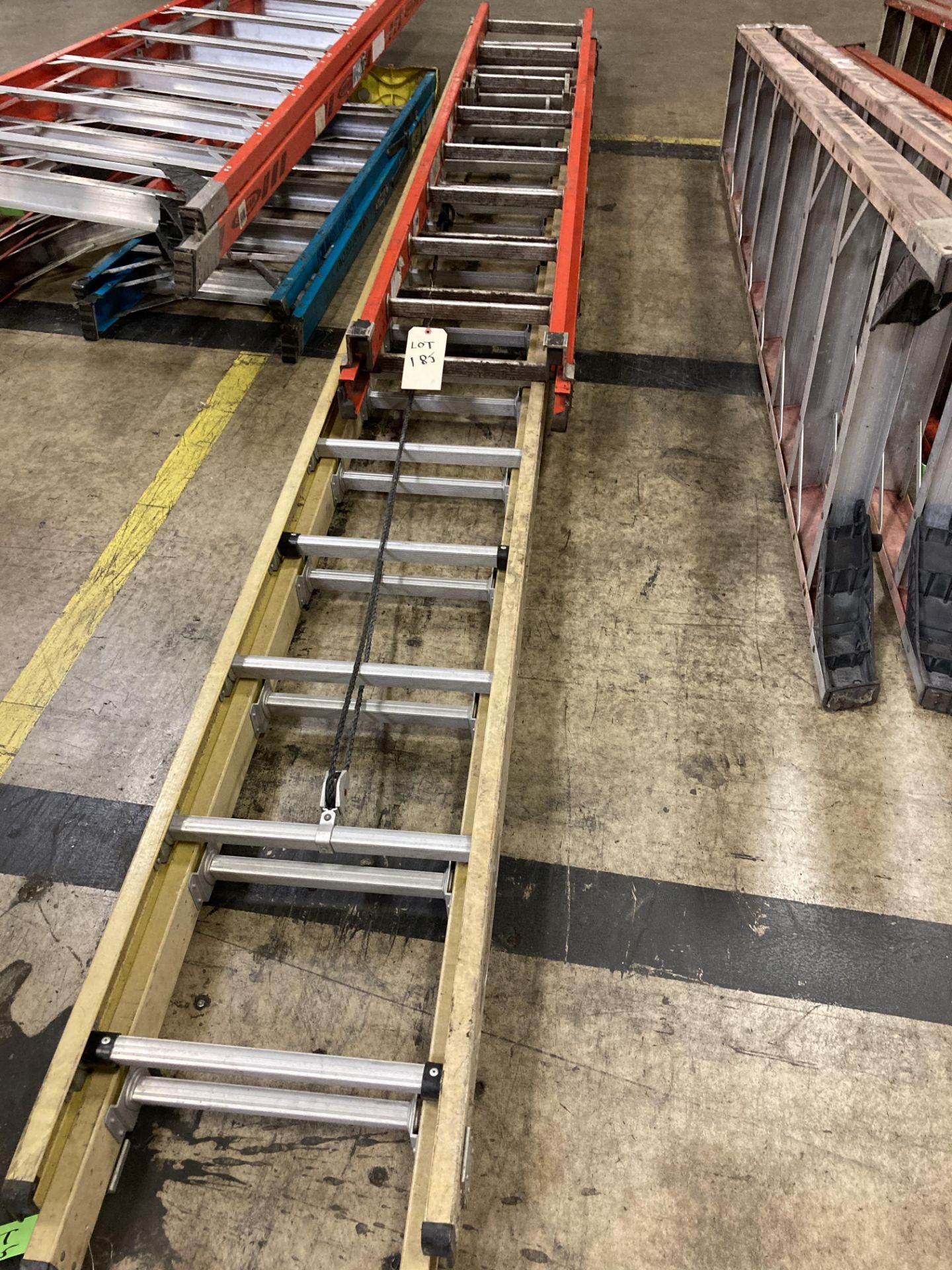 (2) ladders - 16' and 28' extension ladders