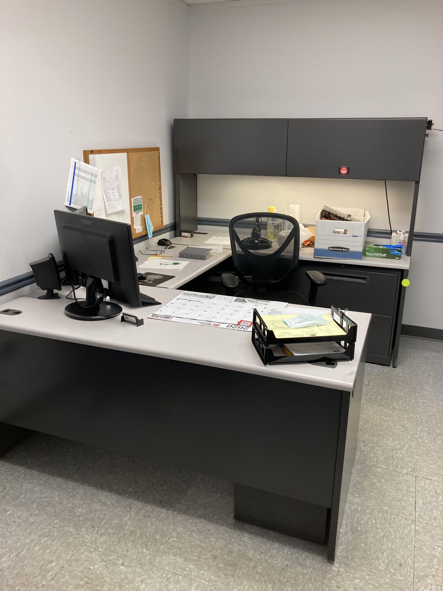 U-shaped desk with upper cabinet and black metal shelf