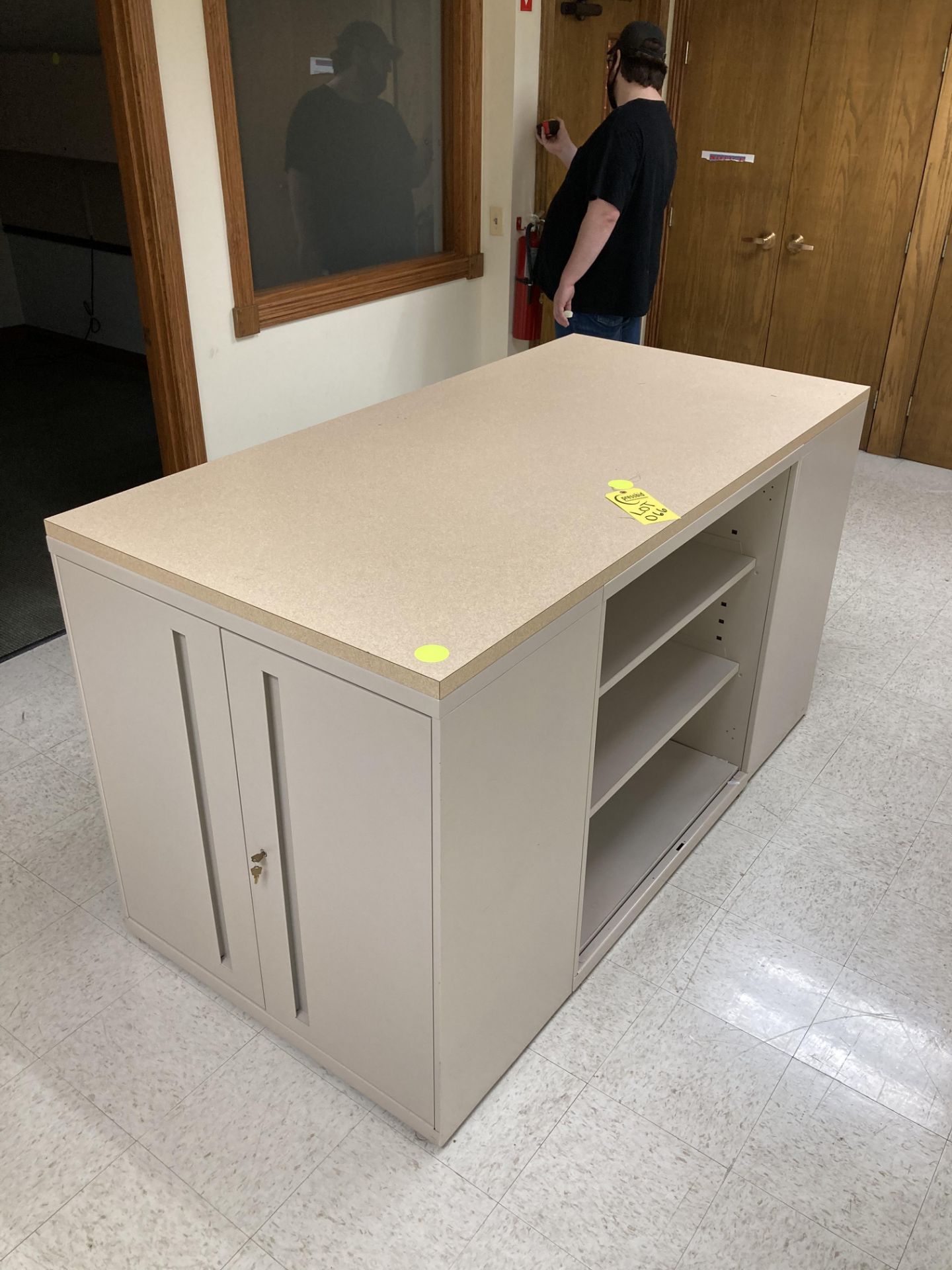 Table with shelf unit and cabinets