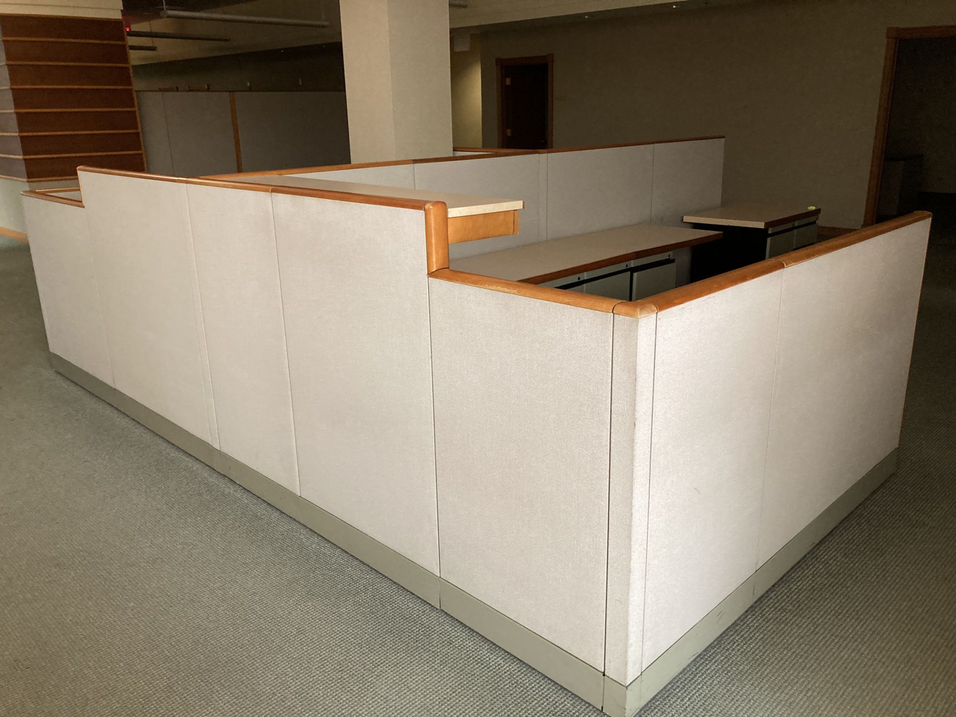 Cubicles with desks and cabinets