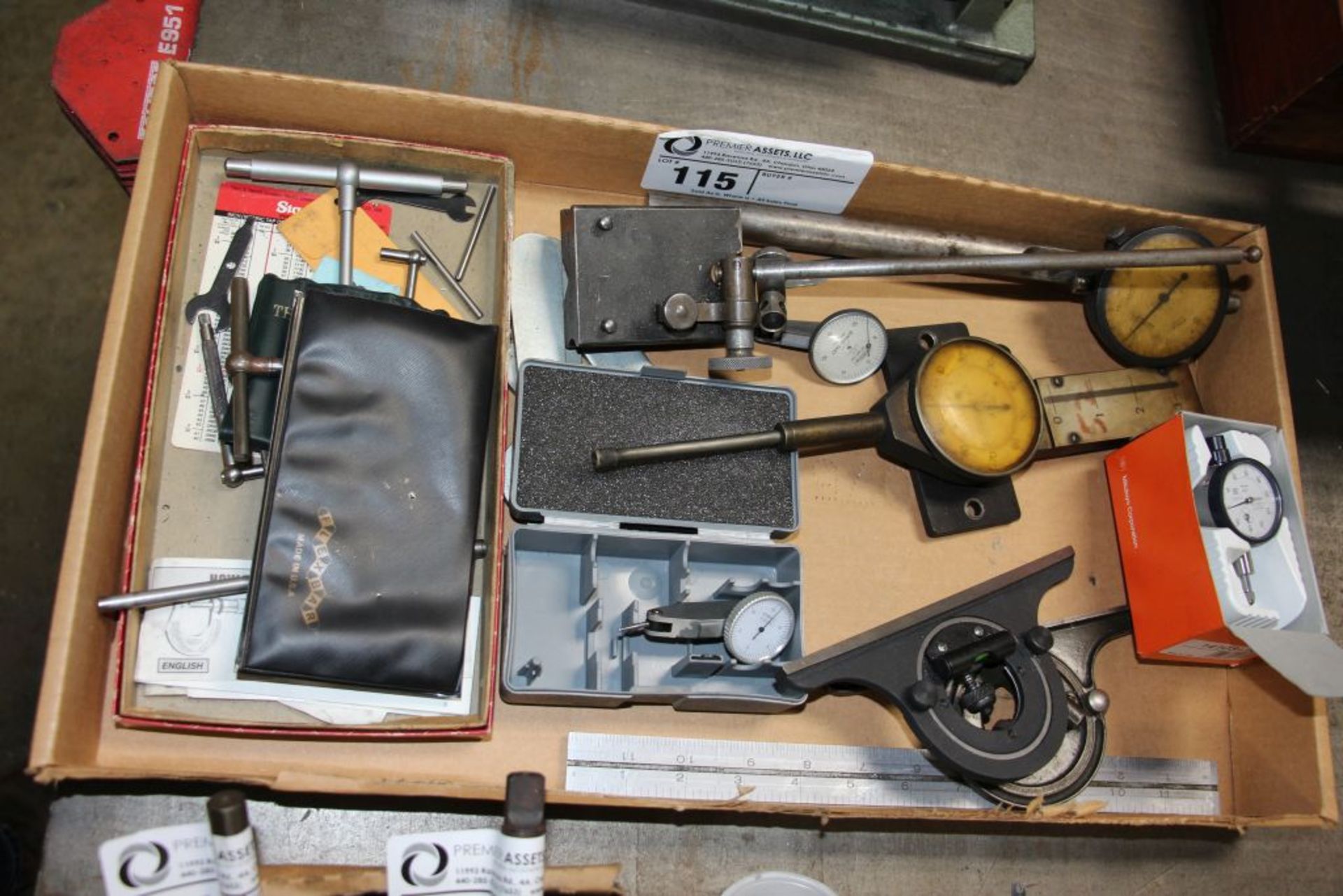 Assortment of precision tools: dial gauges, thread measuring wire set, telescoping gauge, surface