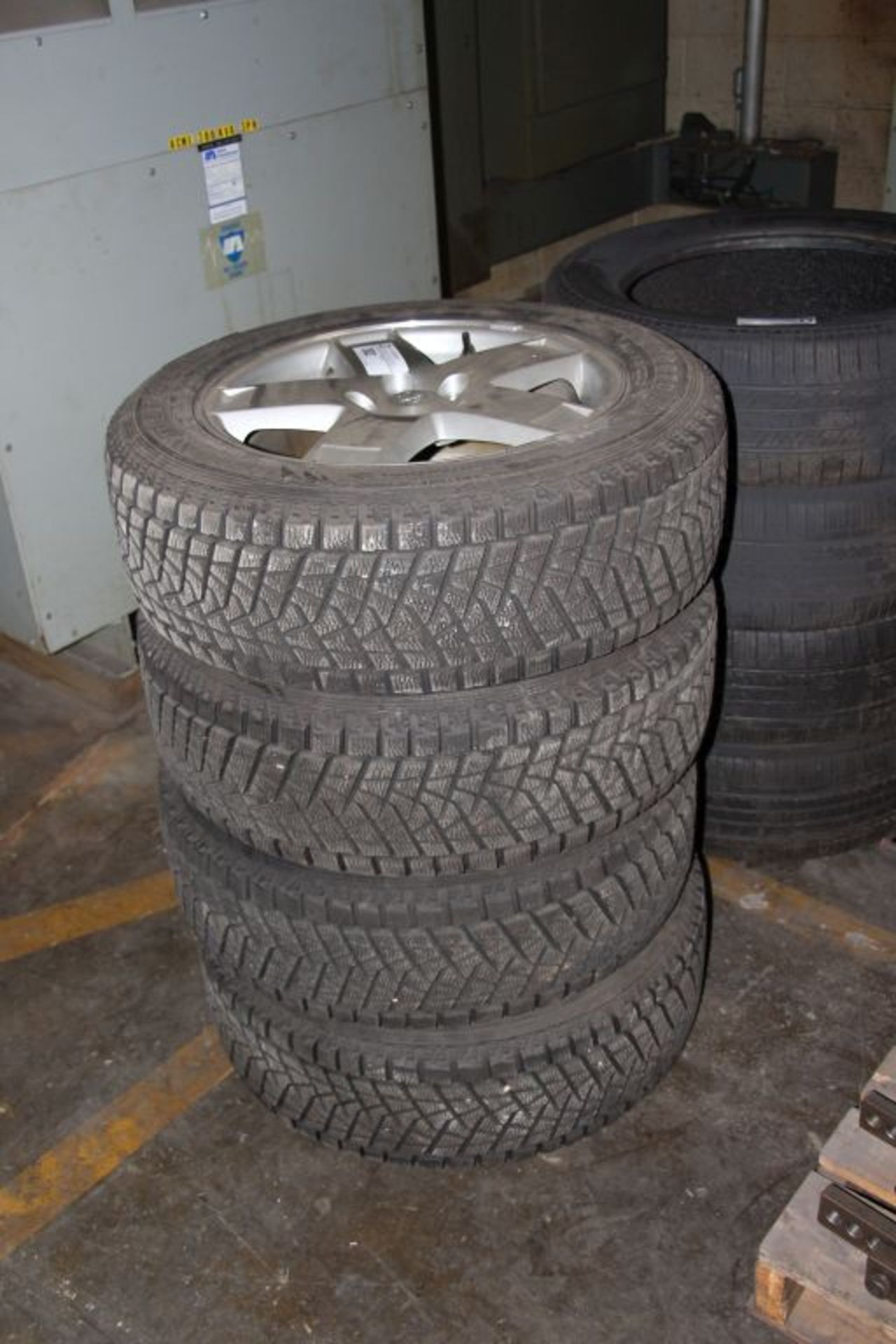 (4) Bridgestone Blizak snow tires, 235/60R18