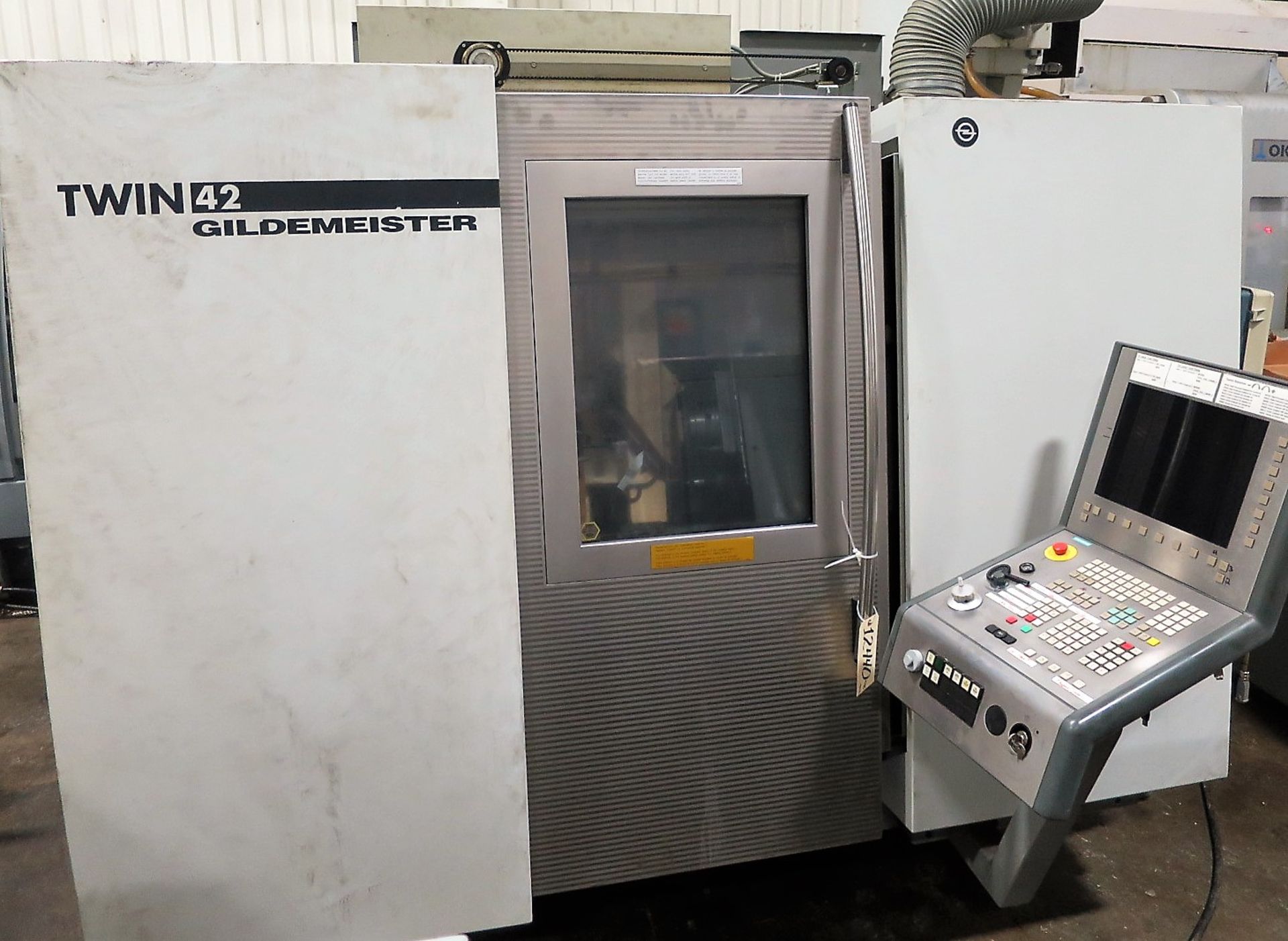 Gildemeister Twin 42, Twin Spindle CNC Lathe, S/N 0700001871, New 2004