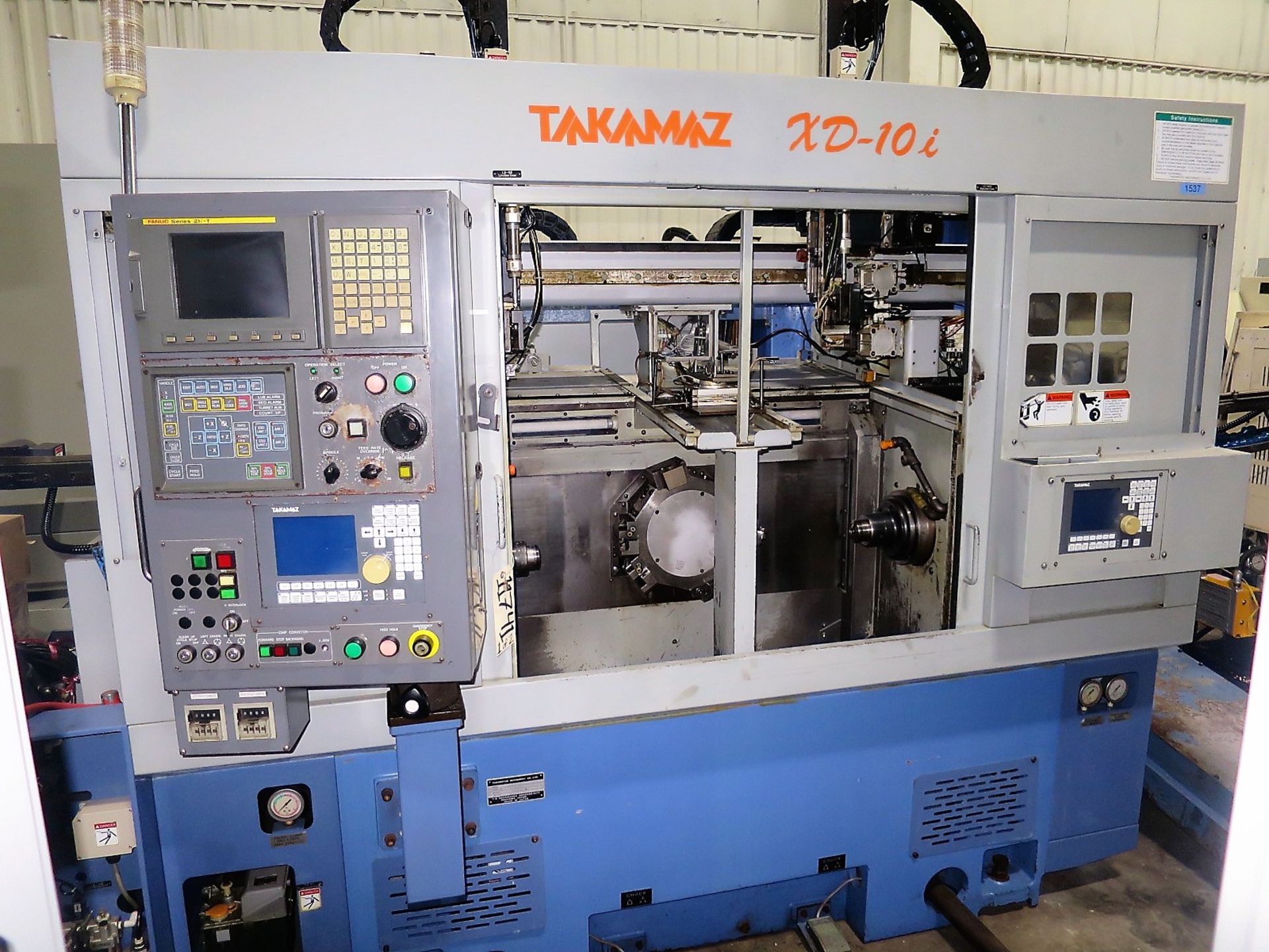 Takamaz Mdl XD-101 CNC Twin Spindle Turning Center w/Gantry Loading System, S/N 300445, New 2006