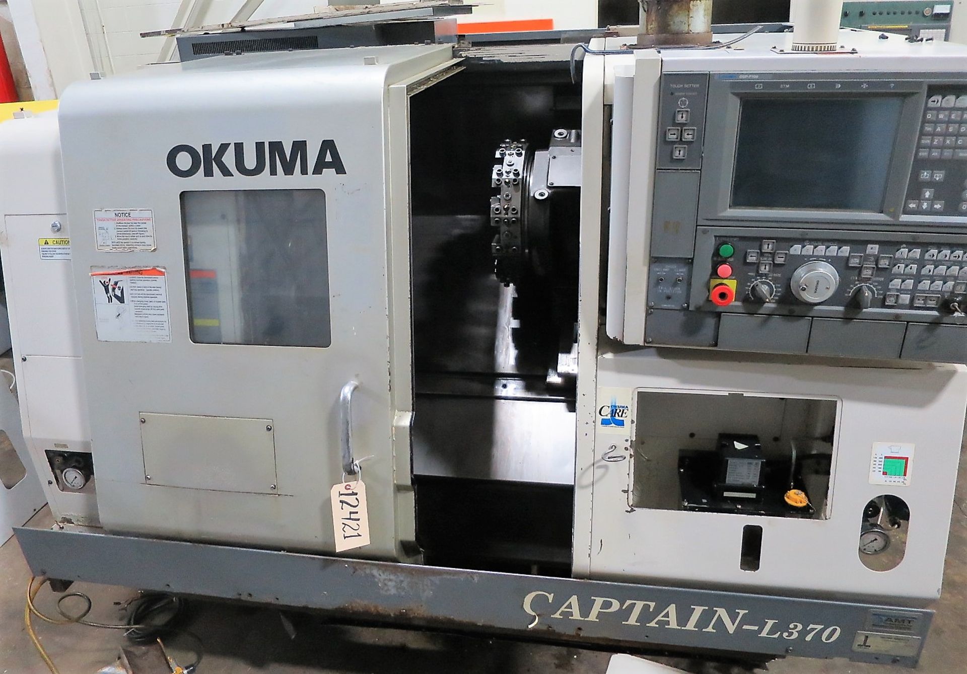 Okuma Captain L370 2-Axis CNC Turning Center Lathe, S/N 116573, New 2005