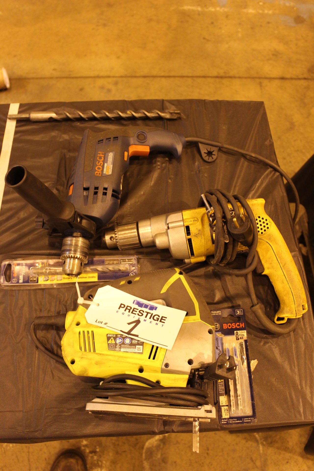 Lot of (1) Ryobi Jig Saw, (1) Dewalt Drill, (1) Black & Decker Saw, (1) Bosch Rotary Hammer Drill