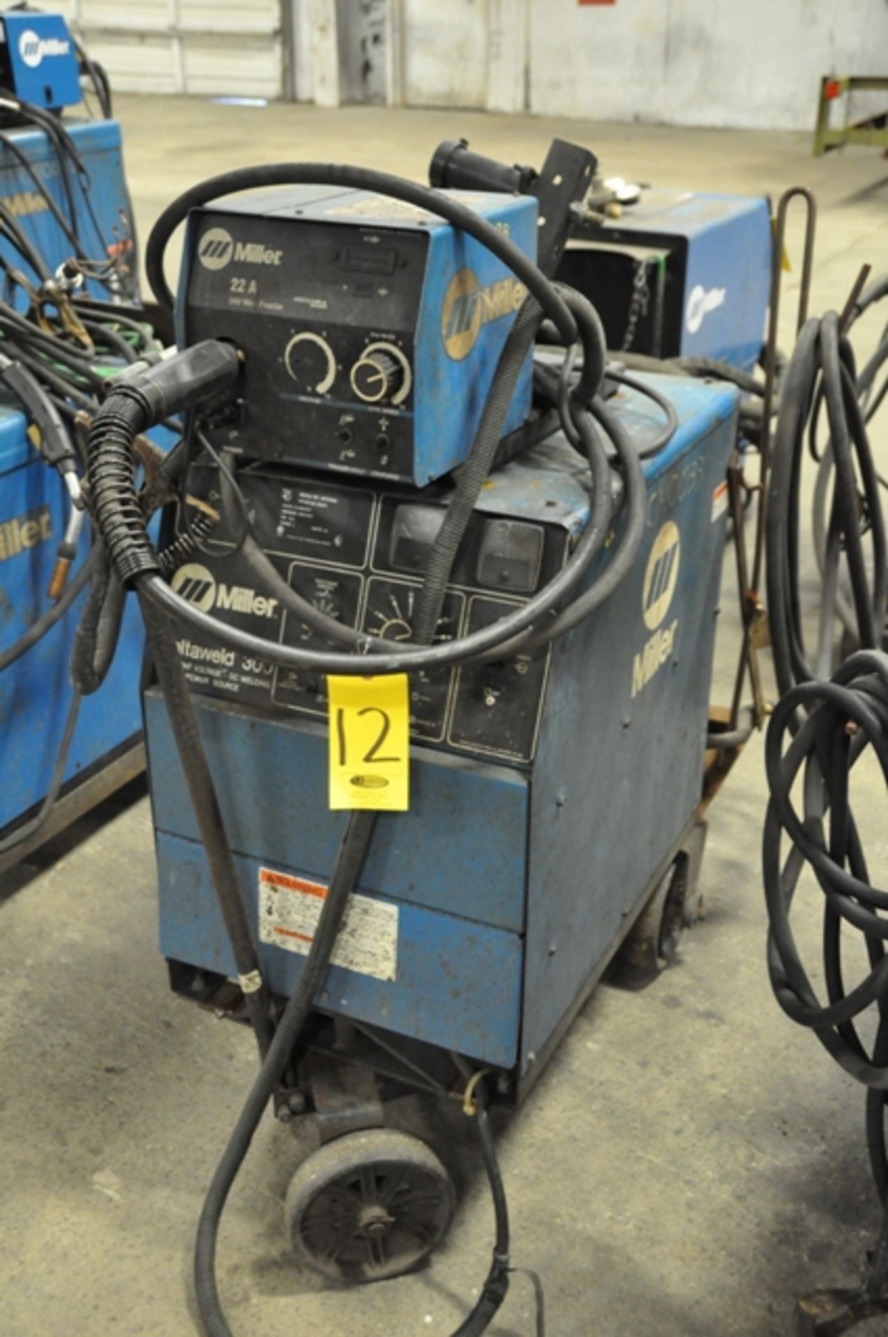 MILLER MIG WELDER, SN. KE703246(1995), MODEL DELTA WELD 300 WITH MILLER 22A WIRE FEEDERS, SN.