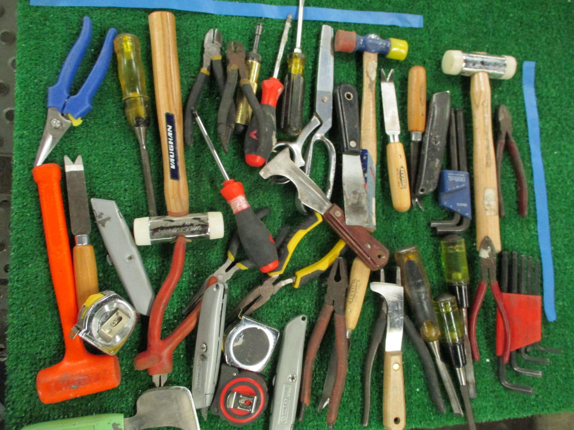 Assorted Hand Tools including Hammers, Screw Drivers, Putty Knives, Utility Knives, Pliers, Snips, T