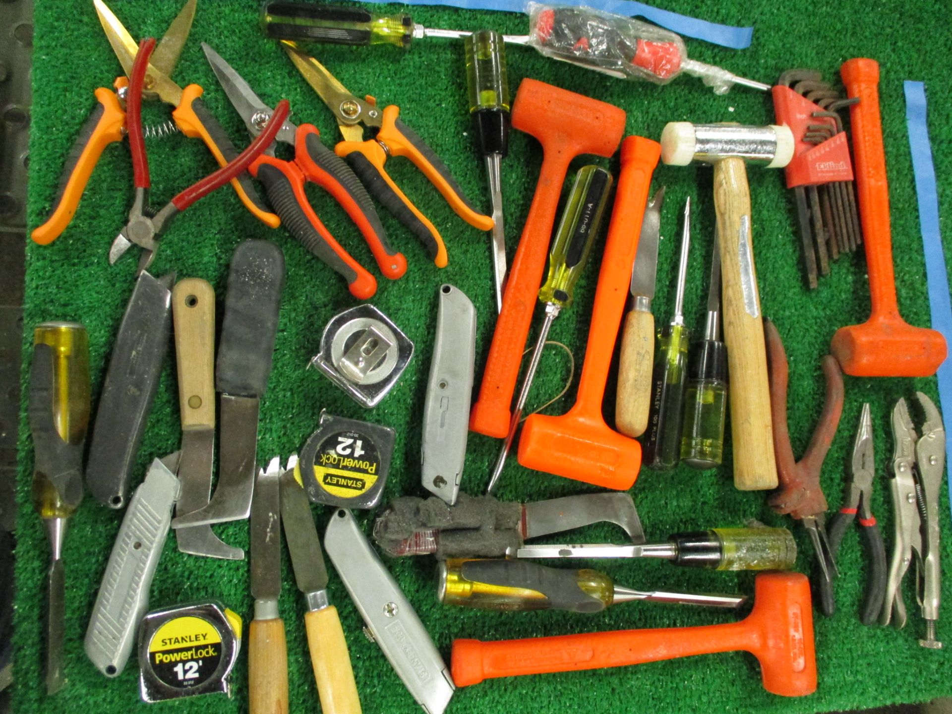 Assorted Hand Tools including Hammers, Screw Drivers, Putty Knives, Utility Knives, Pliers, Snips, T