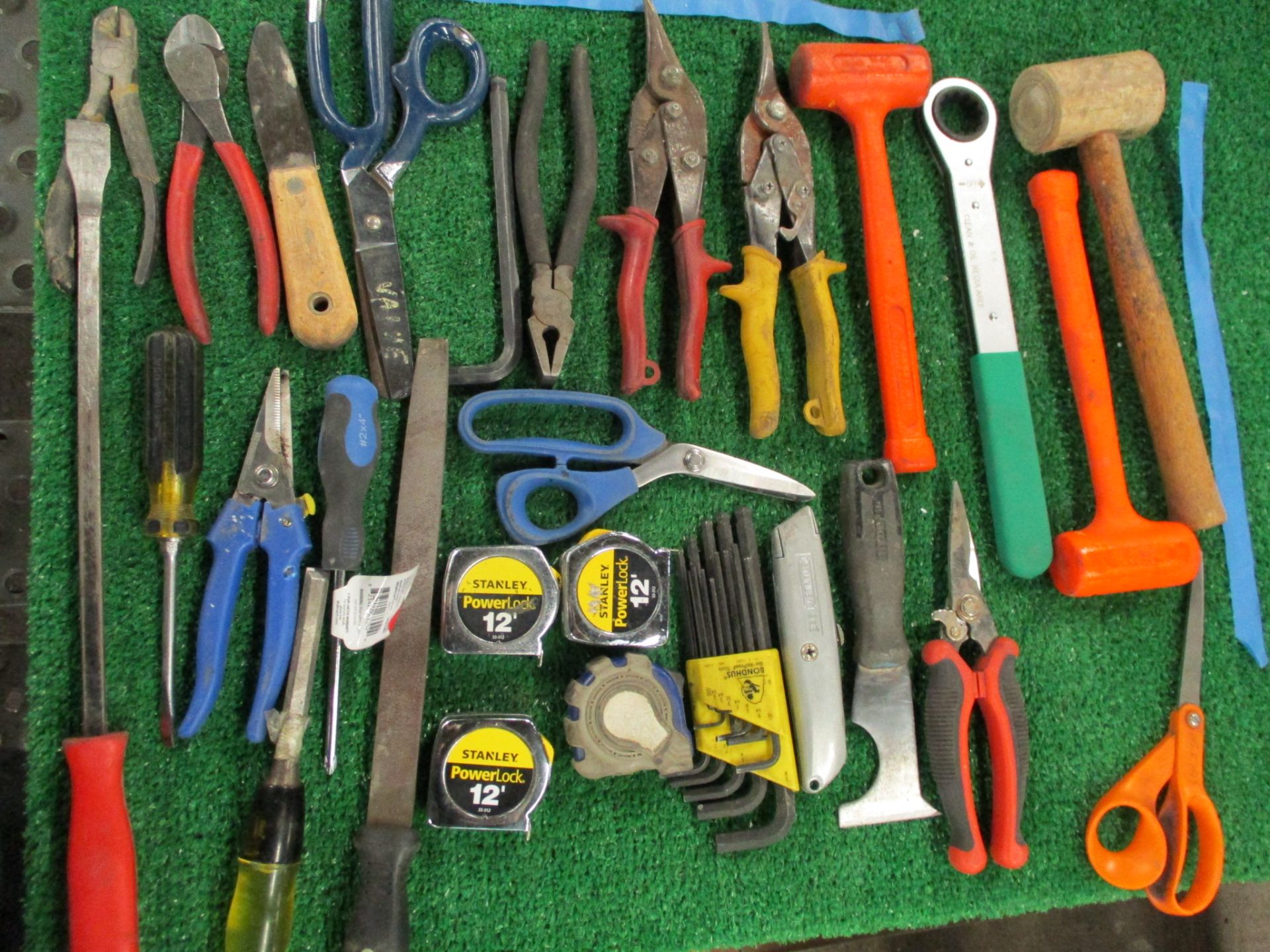 Assorted Hand Tools including Hammers, Screw Drivers, Putty Knives, Utility Knives, Pliers, Snips, T