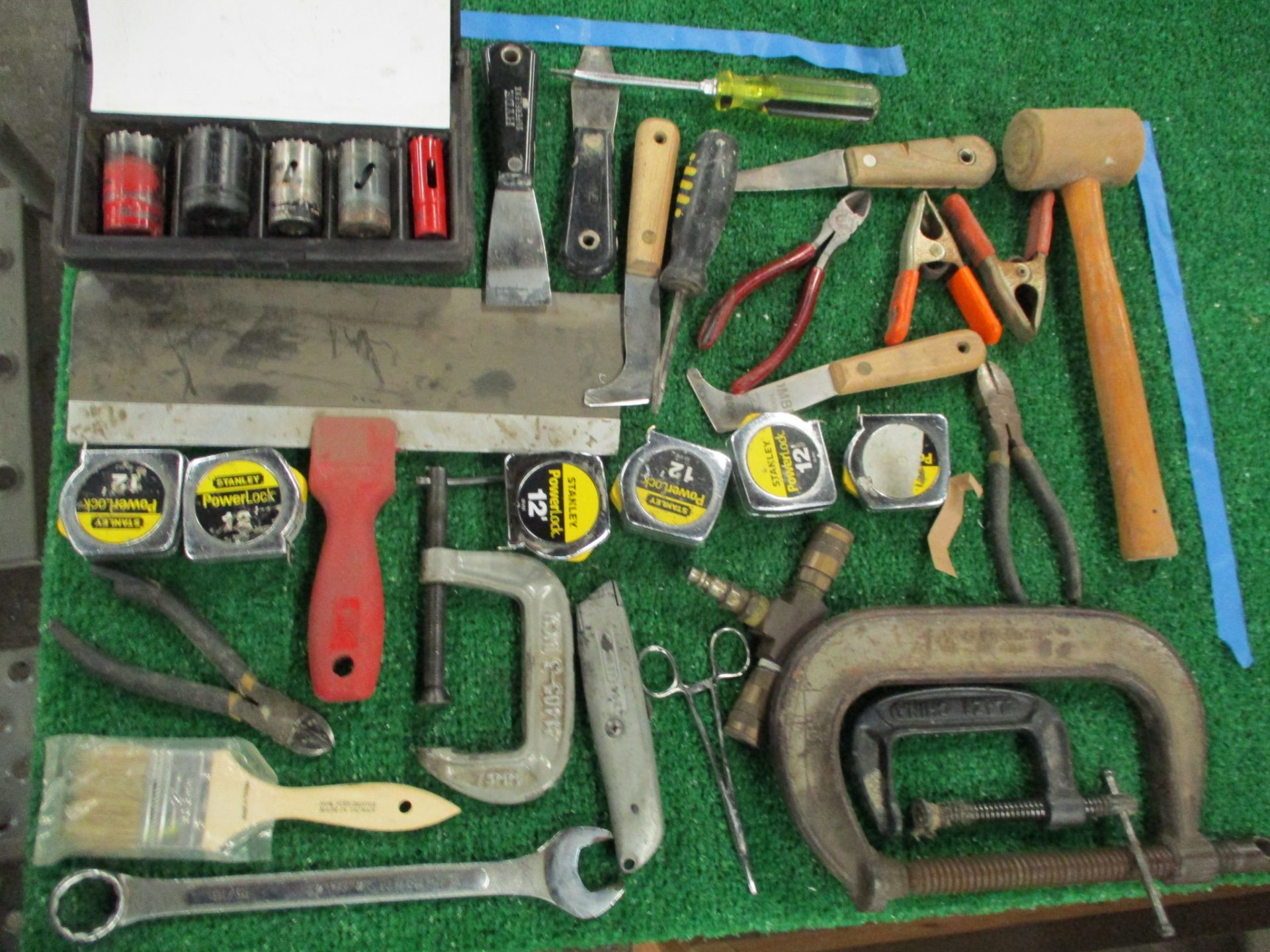 Assorted Hand Tools including Hammers, Screw Drivers, Putty Knives, Utility Knives, Pliers, Snips, T