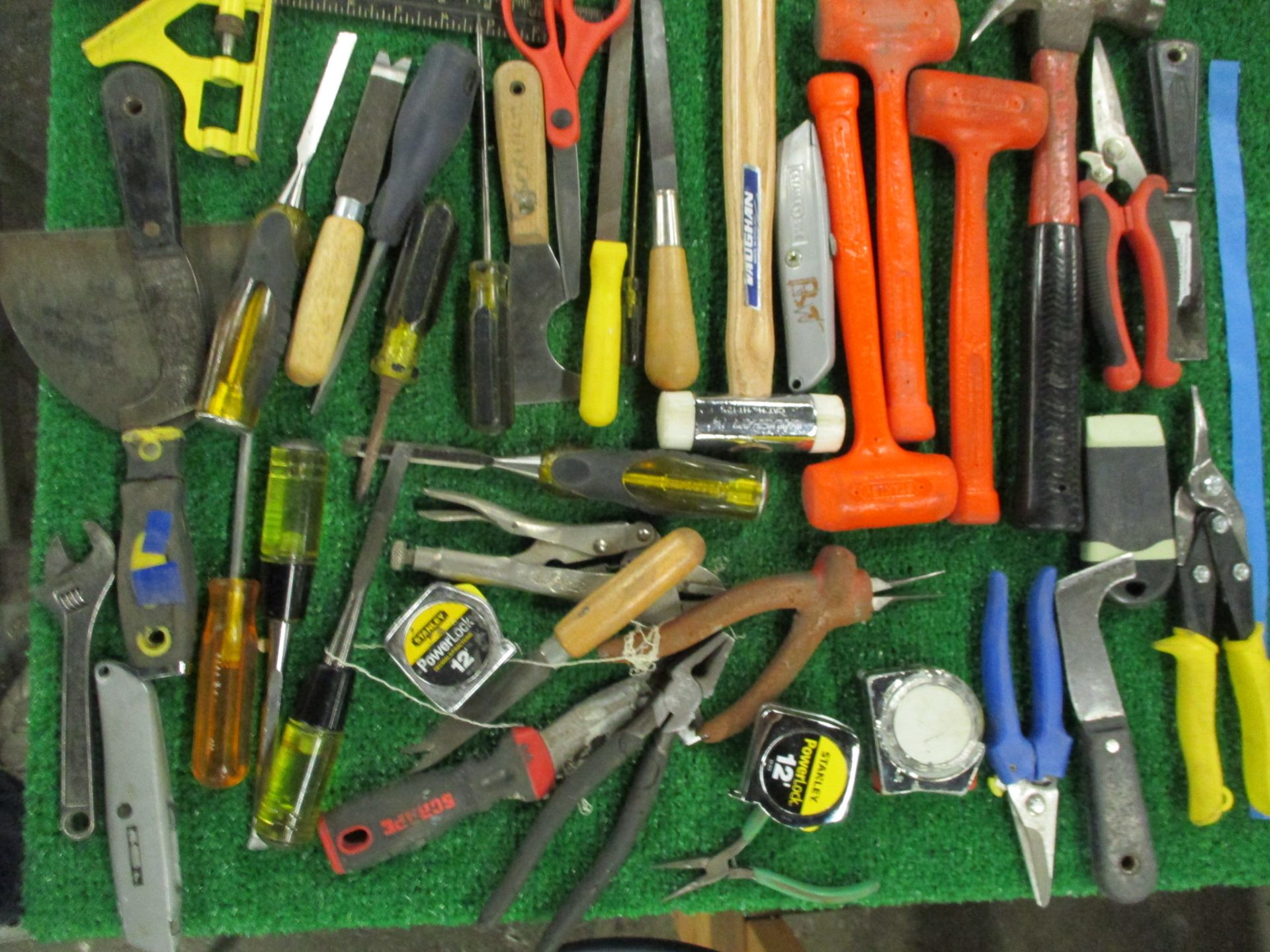 Assorted Hand Tools including Hammers, Screw Drivers, Putty Knives, Utility Knives, Pliers, Snips, T