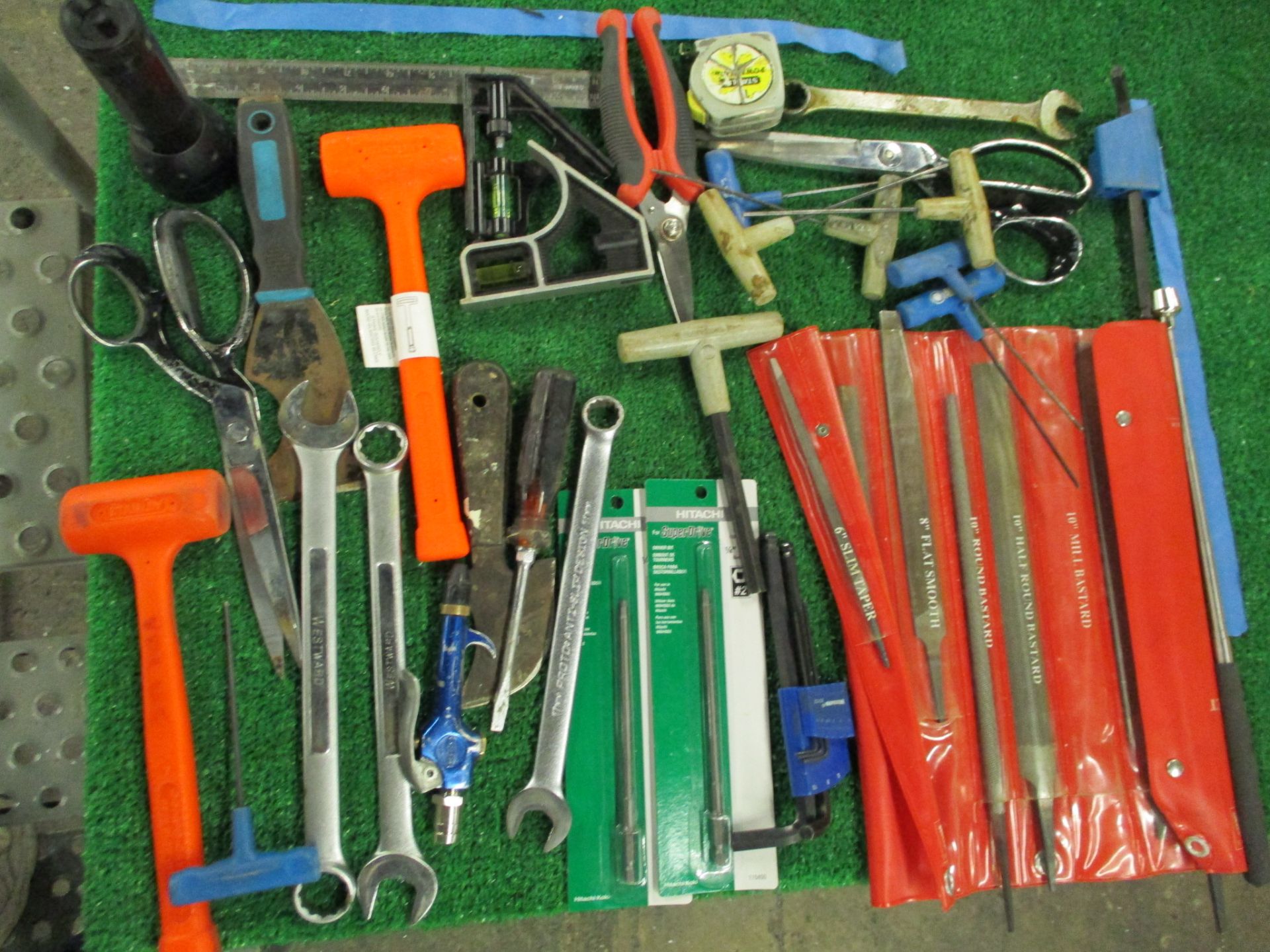 Assorted Hand Tools including Hammers, Screw Drivers, Putty Knives, Utility Knives, Pliers, Snips, T