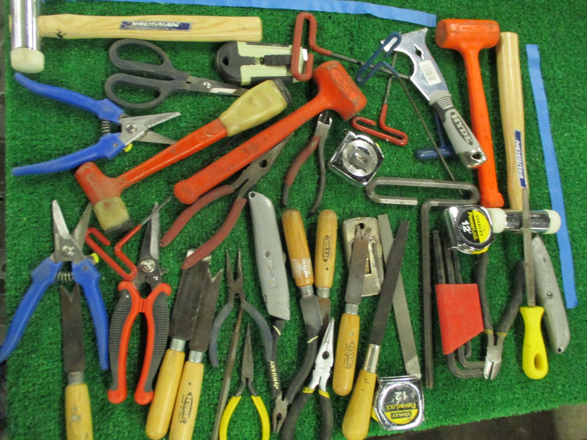 Assorted Hand Tools including Hammers, Screw Drivers, Putty Knives, Utility Knives, Pliers, Snips, T