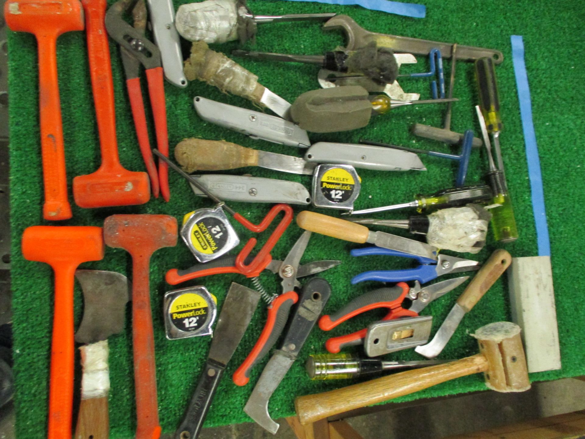 Assorted Hand Tools including Hammers, Screw Drivers, Putty Knives, Utility Knives, Pliers, Snips, T