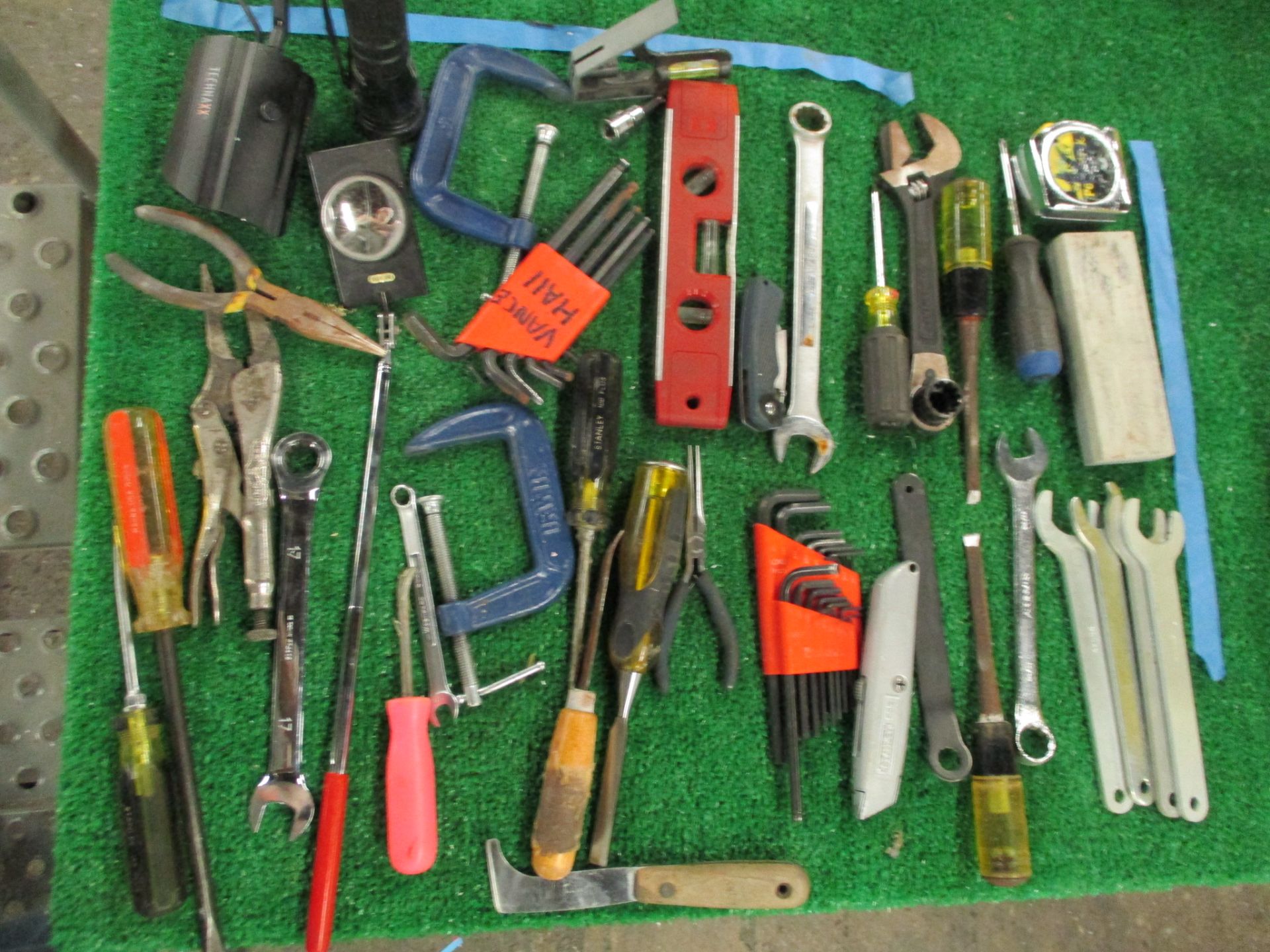 Assorted Hand Tools including Hammers, Screw Drivers, Putty Knives, Utility Knives, Pliers, Snips, T