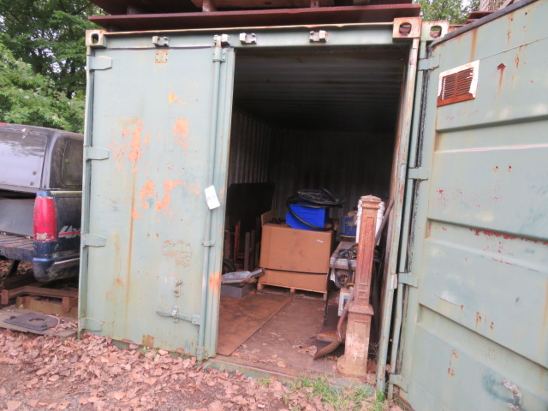 20 FT. STORAGE CONTAINER (MISSING ONE DOOR) - (CONTENTS NOT INCLUDED - CALL PRIOR TO REMOVAL)