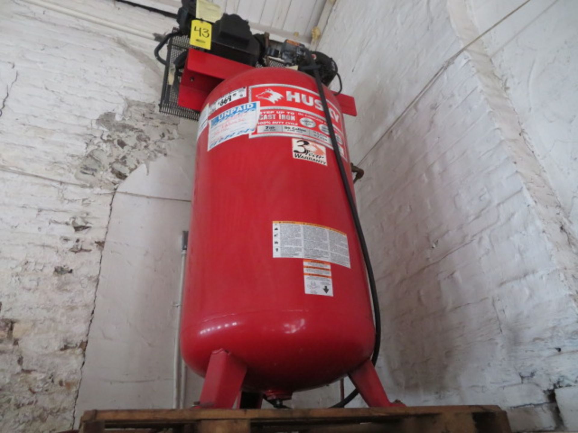 HUSKY 7 HP UPRIGHT AIR COMPRESSOR W/80 GALLON TANK MOUNTED ON 8 FT. SHELF ABOVE FLOOR LEVEL - Image 2 of 3