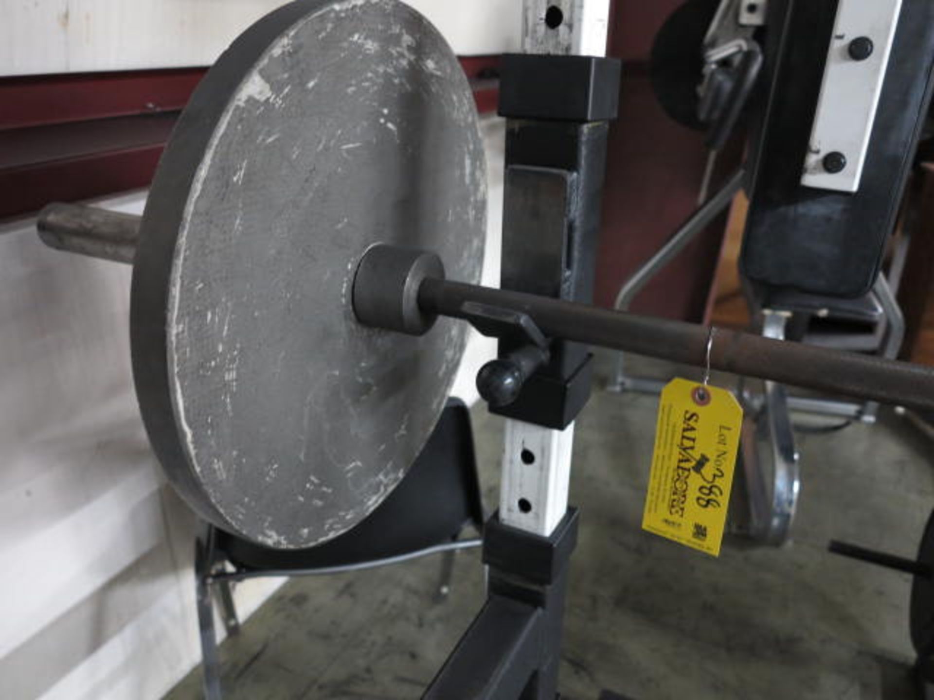 Olympic Bar & (2) Weights. Item is Located on Mezzanine