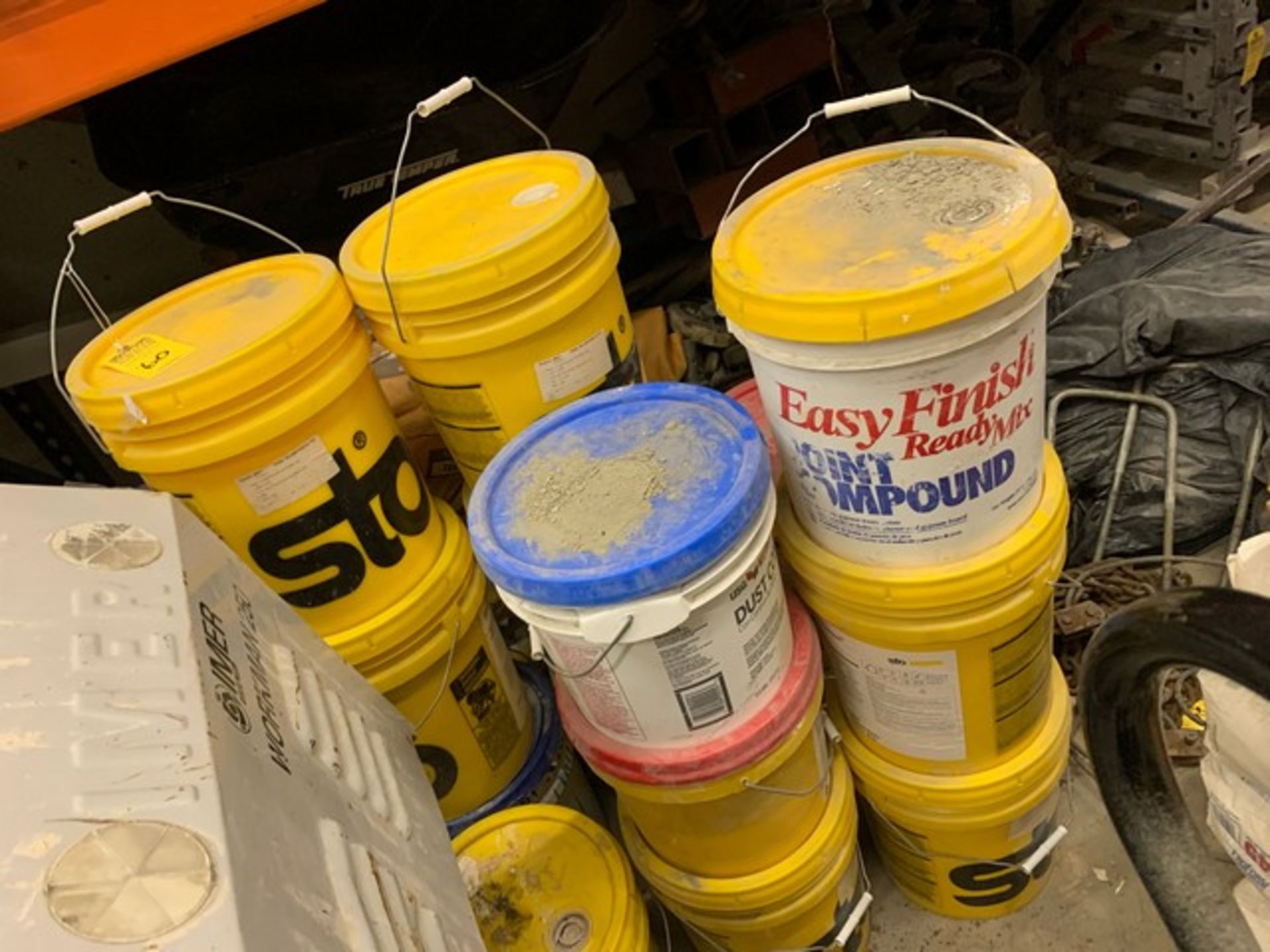 ASSORTED BUCKETS & BAGS OF STUCCO, ADHESIVE, ETC