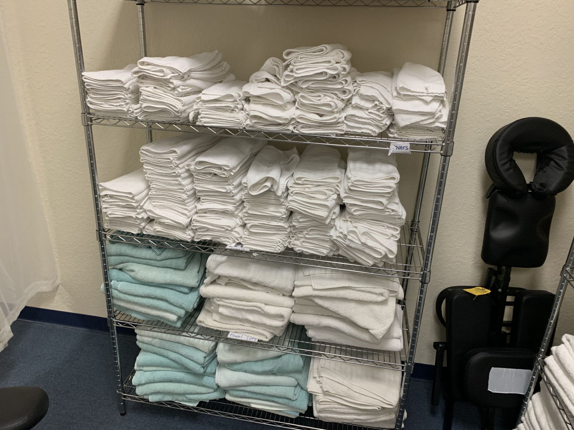 LOT TOWELS (ON RACKS, IN CABINETS, ETC)