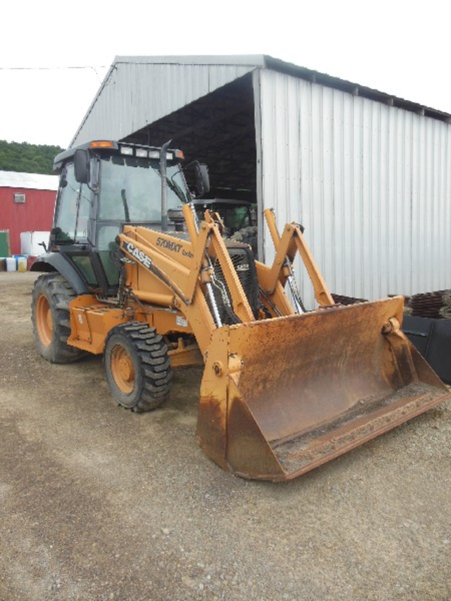 2005 Case Tractor Loader Model 570MXT, S/N JJG0302374 (3023 Hrs.), w/ Weights, 4WD, 4-1 Bucket,