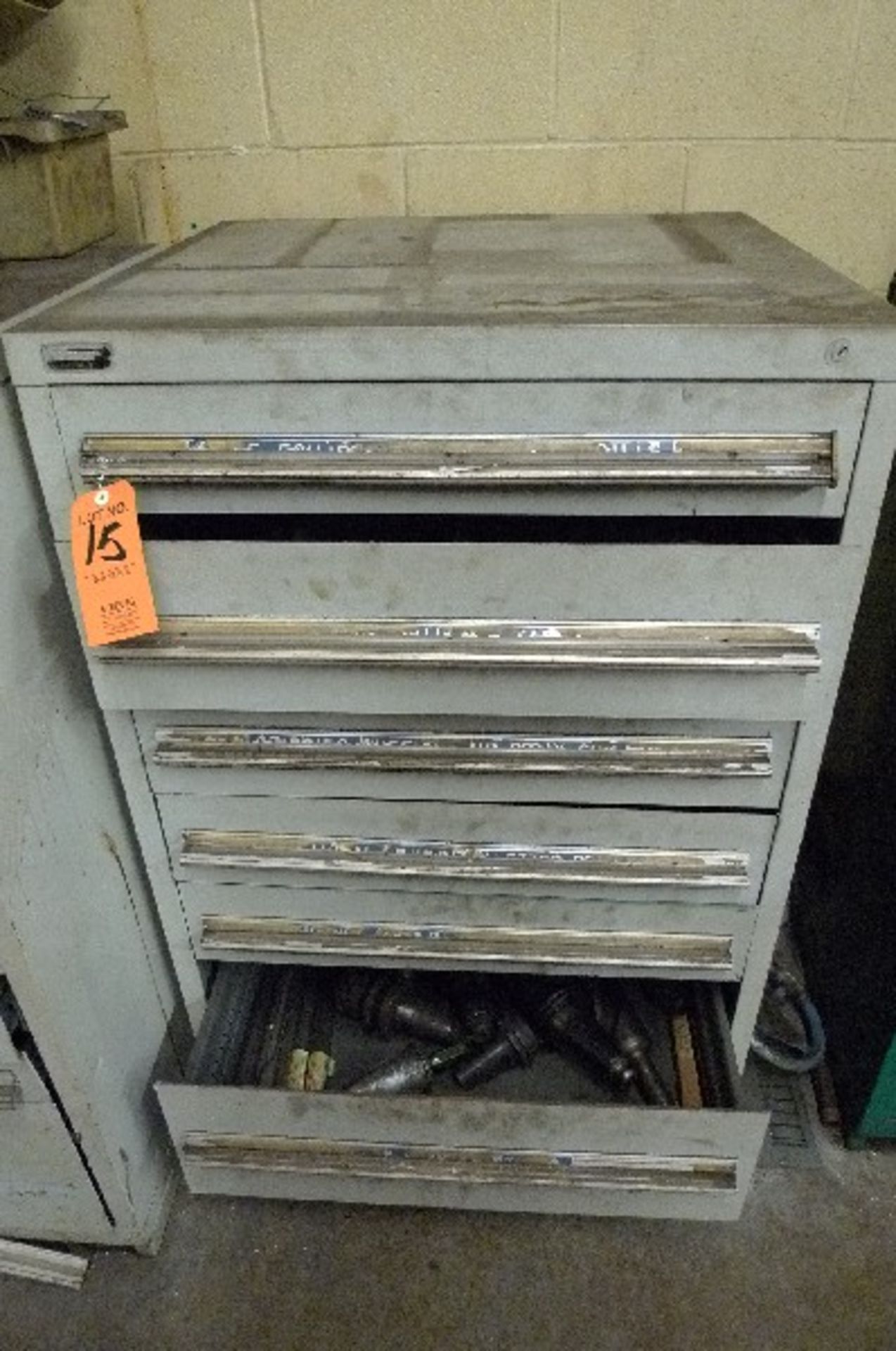 LOT: CABINET W/ LARGE DRILLS & CUTTERS