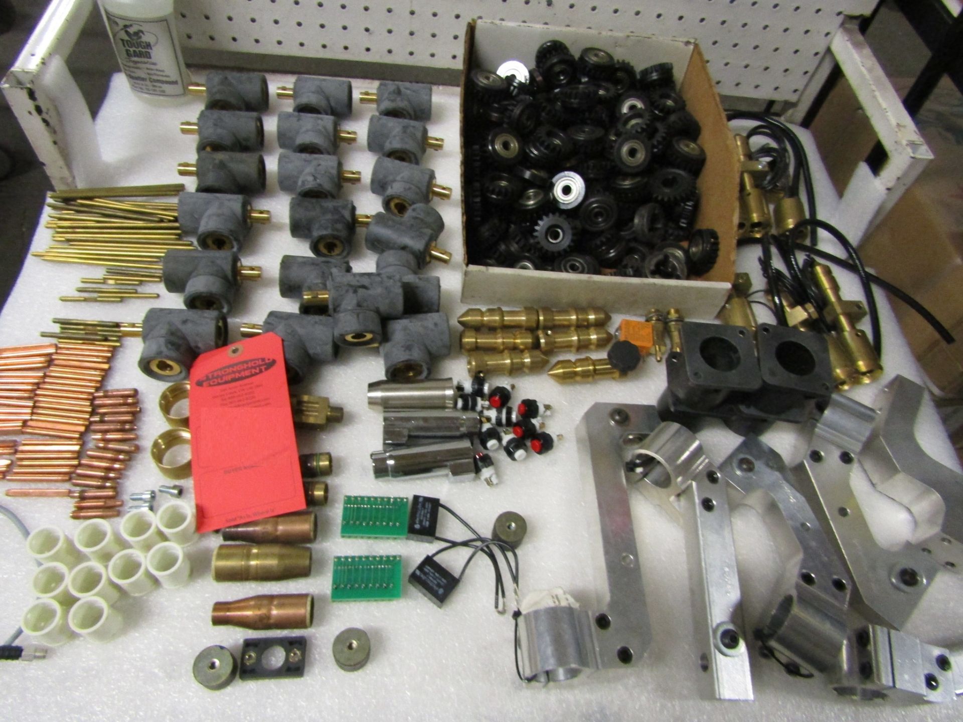 Assorted Welding Robot Parts - hundreds of wire wheels, nozzle tips, connectors, robotic arm