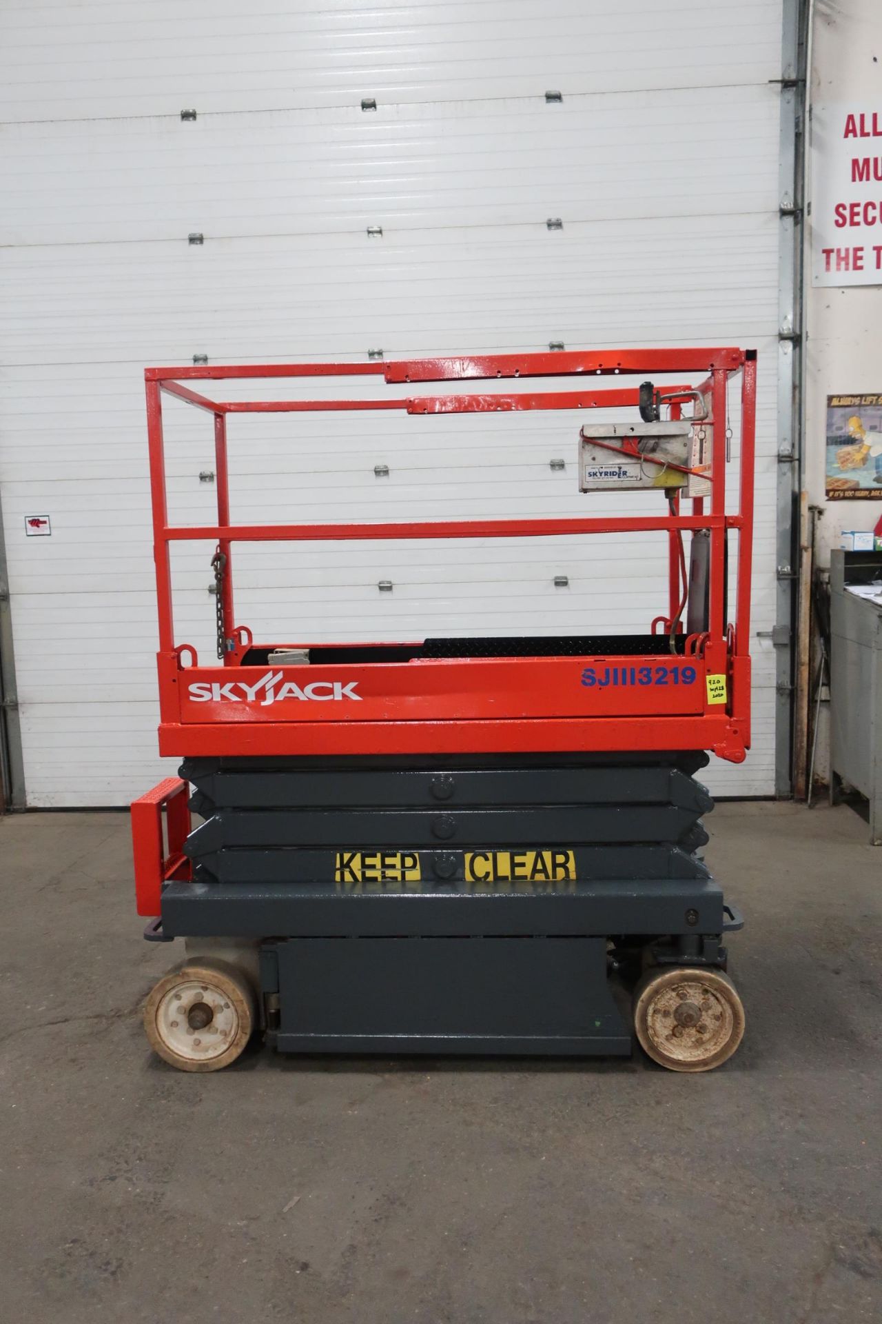 2008 SkyJack III Electric Scissor Lift model 3220 - 20 feet lift, 32 inch width deck with pendant