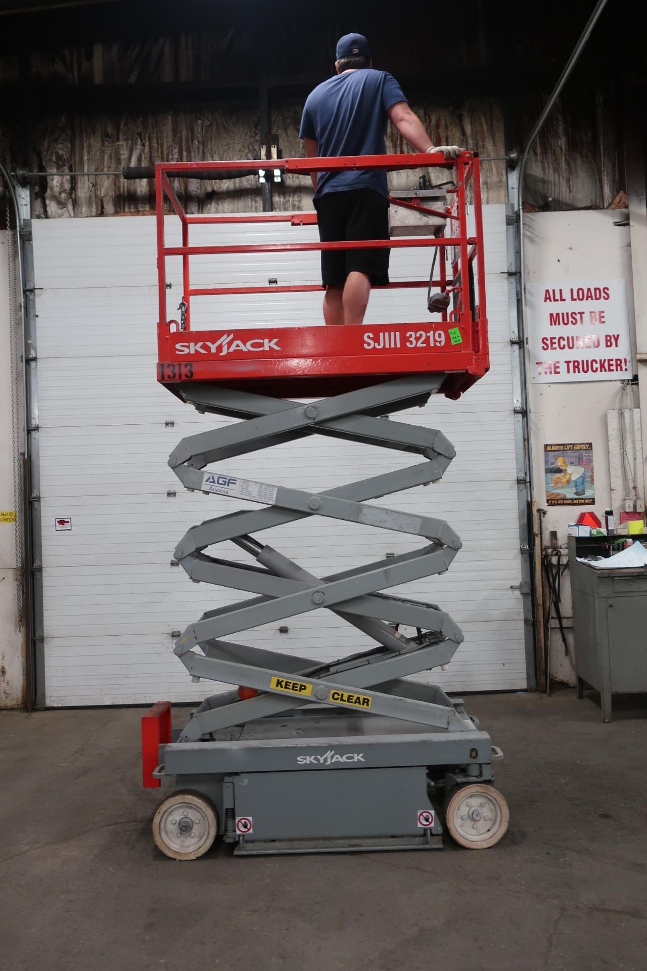 SkyJack III Electric Scissor Lift model 3219 - 19 feet lift, 32 inch width deck with pendant