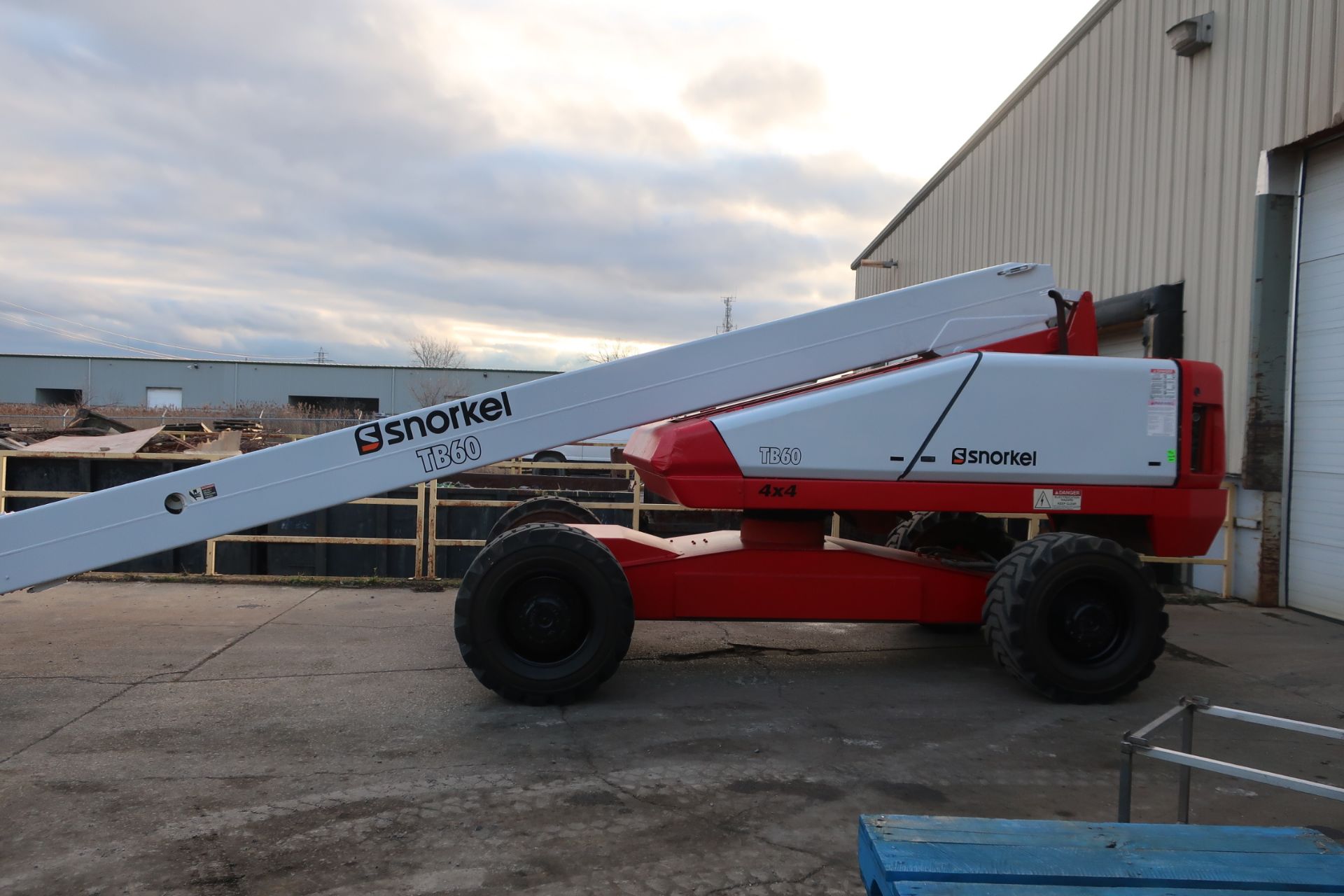 MINT Snorkel Boom Lift model TB-60 with 60' platform height and 500lbs lifting capacity 4x4 with low