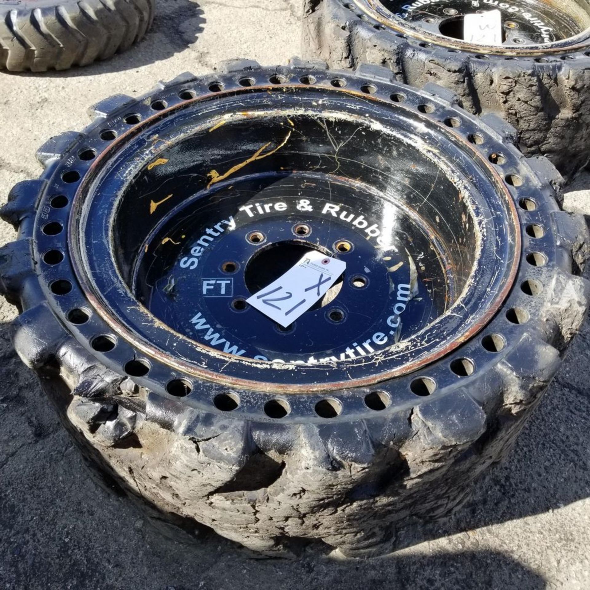 Century tire and rubber, 8 lug, 40-50% thread, solid tires for John deere/ Bobcat.